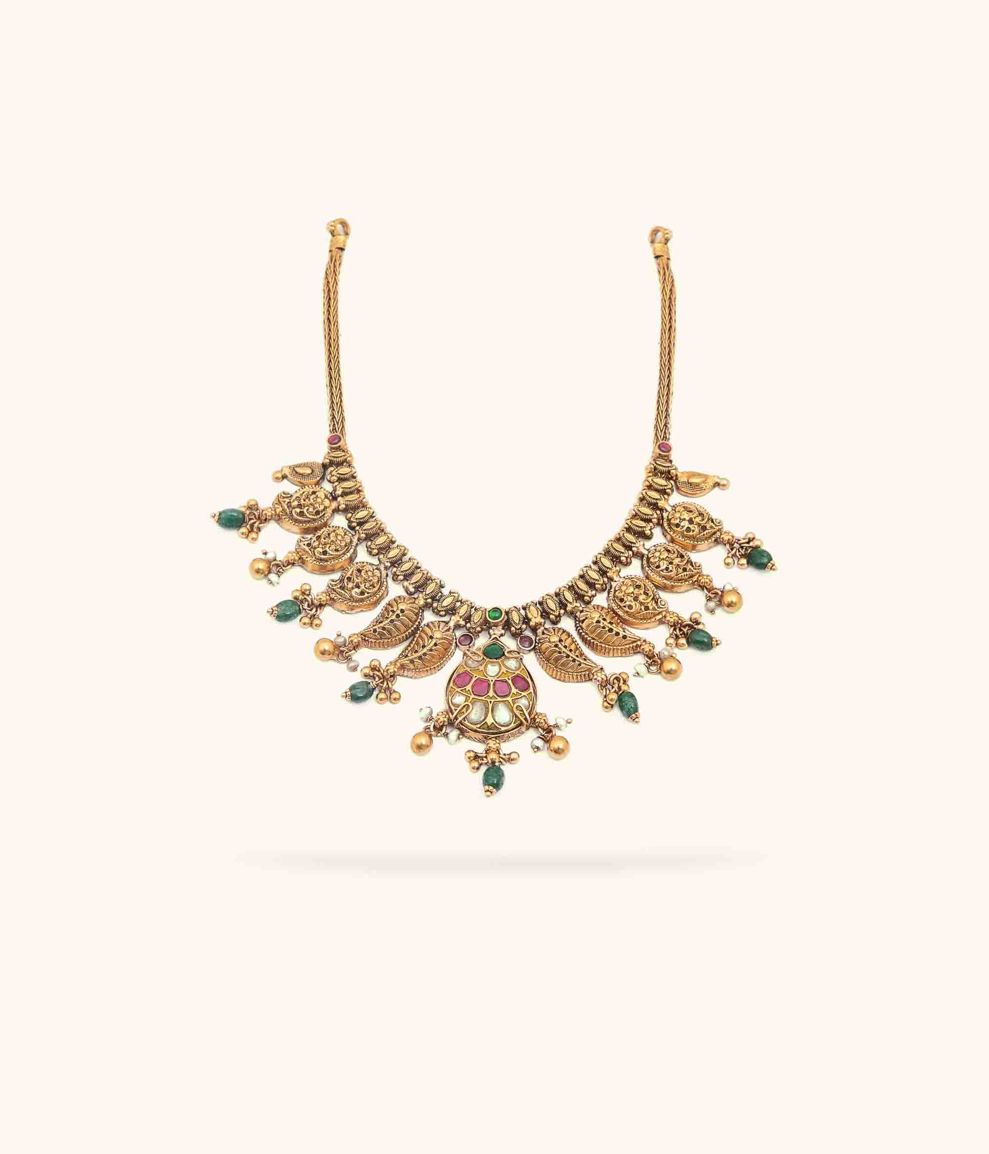 DivasMantra handcrafted Nakshi necklace in silver with gold plated paisley motifs