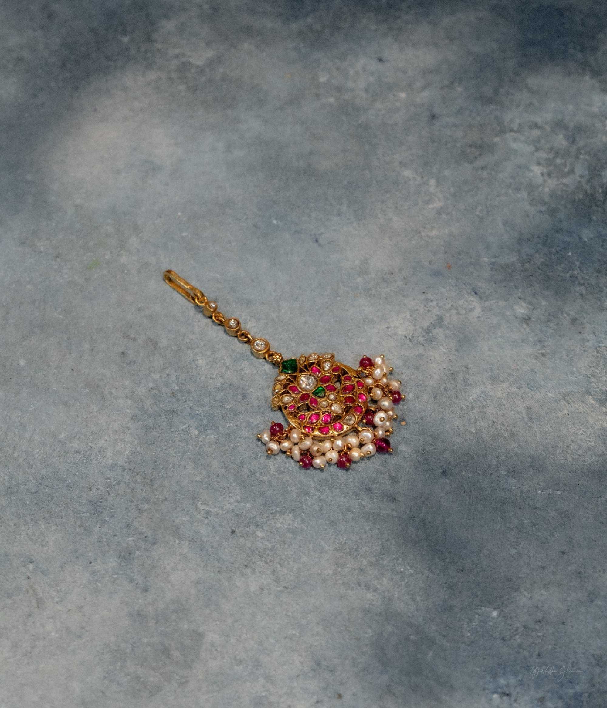 Elegant Kamala Tikka with Red Green and White Kundan Stones