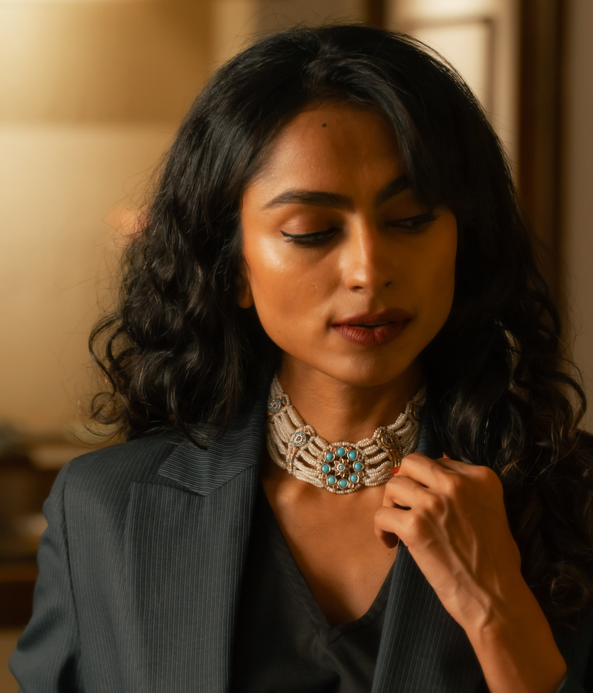 Pearl-woven choker with central turquoise floral motif, ruby accents, and elegant Leelah-style craftsmanship.