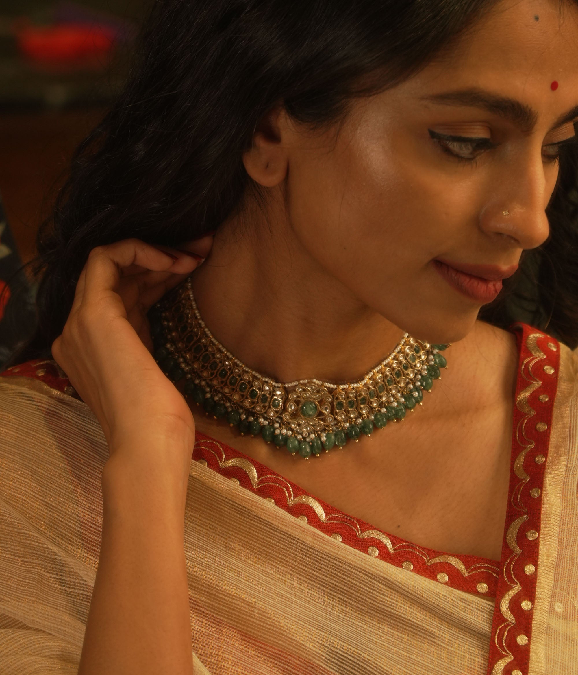 Emerald and pearl choker from the Leelah Collection with white sapphires and intricate lattice design.