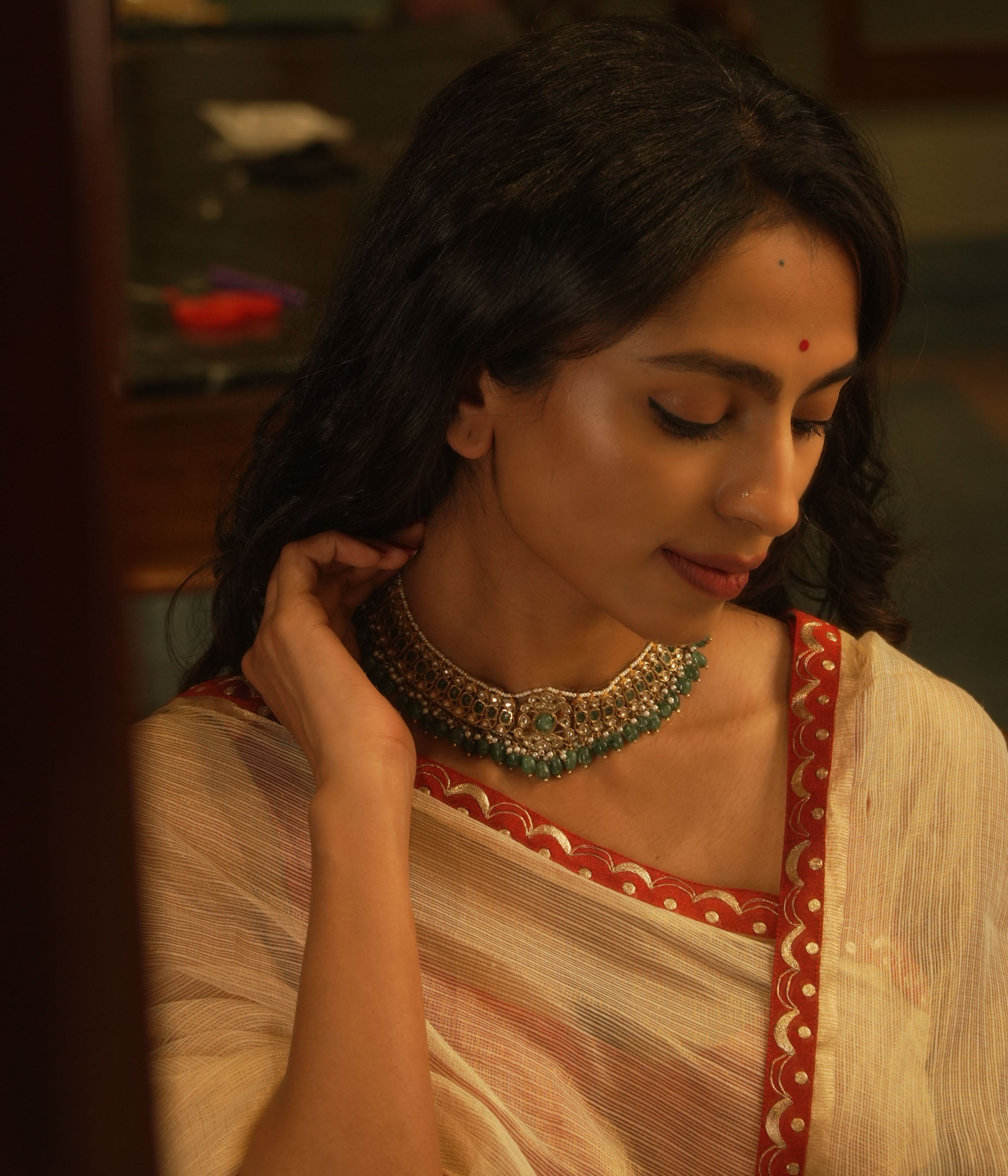 Emerald and pearl choker from the Leelah Collection with white sapphires and intricate lattice design.