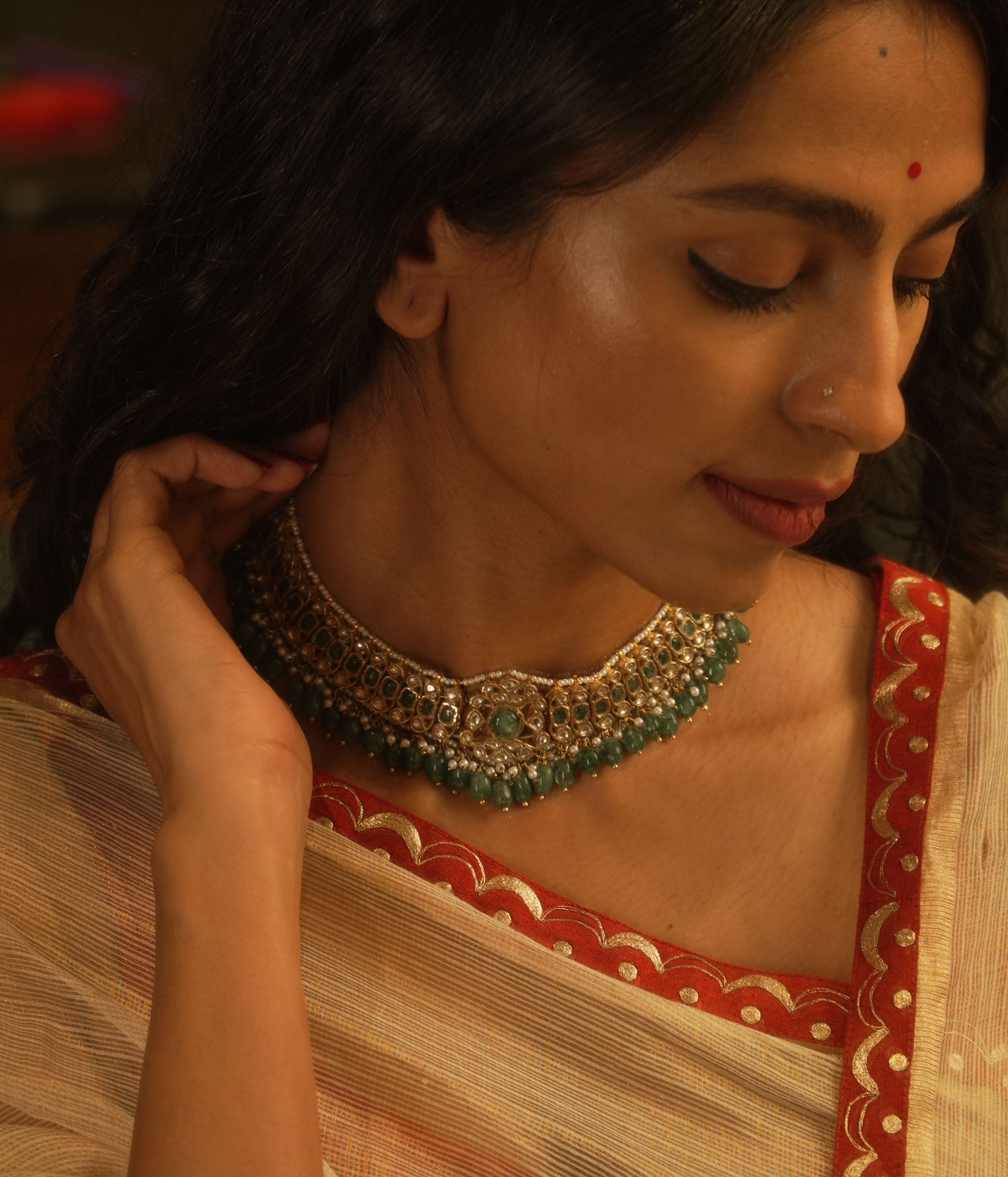Emerald and pearl choker from the Leelah Collection with white sapphires and intricate lattice design.