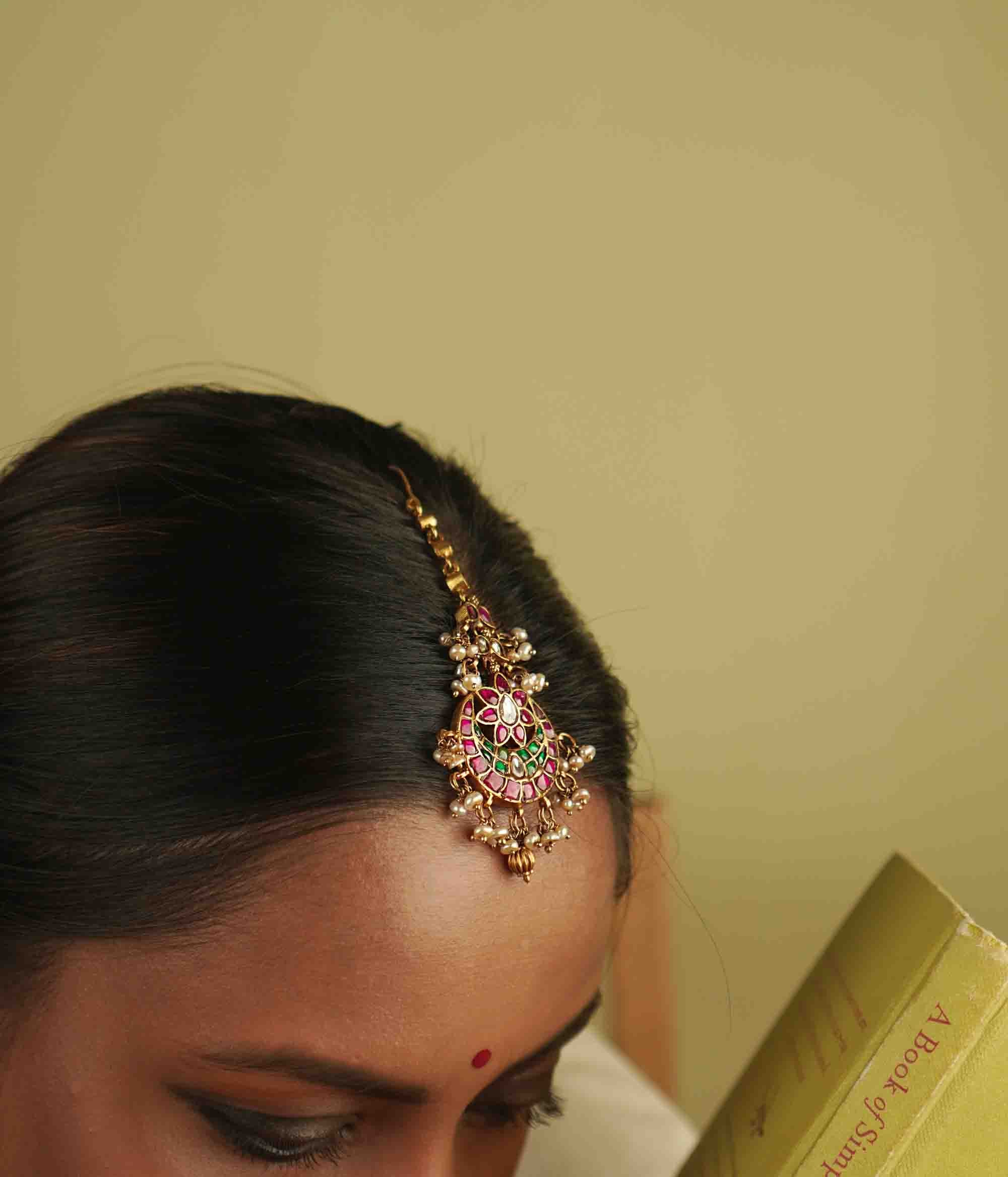 Handcrafted bridal maangtika with pearls and kundan detailing