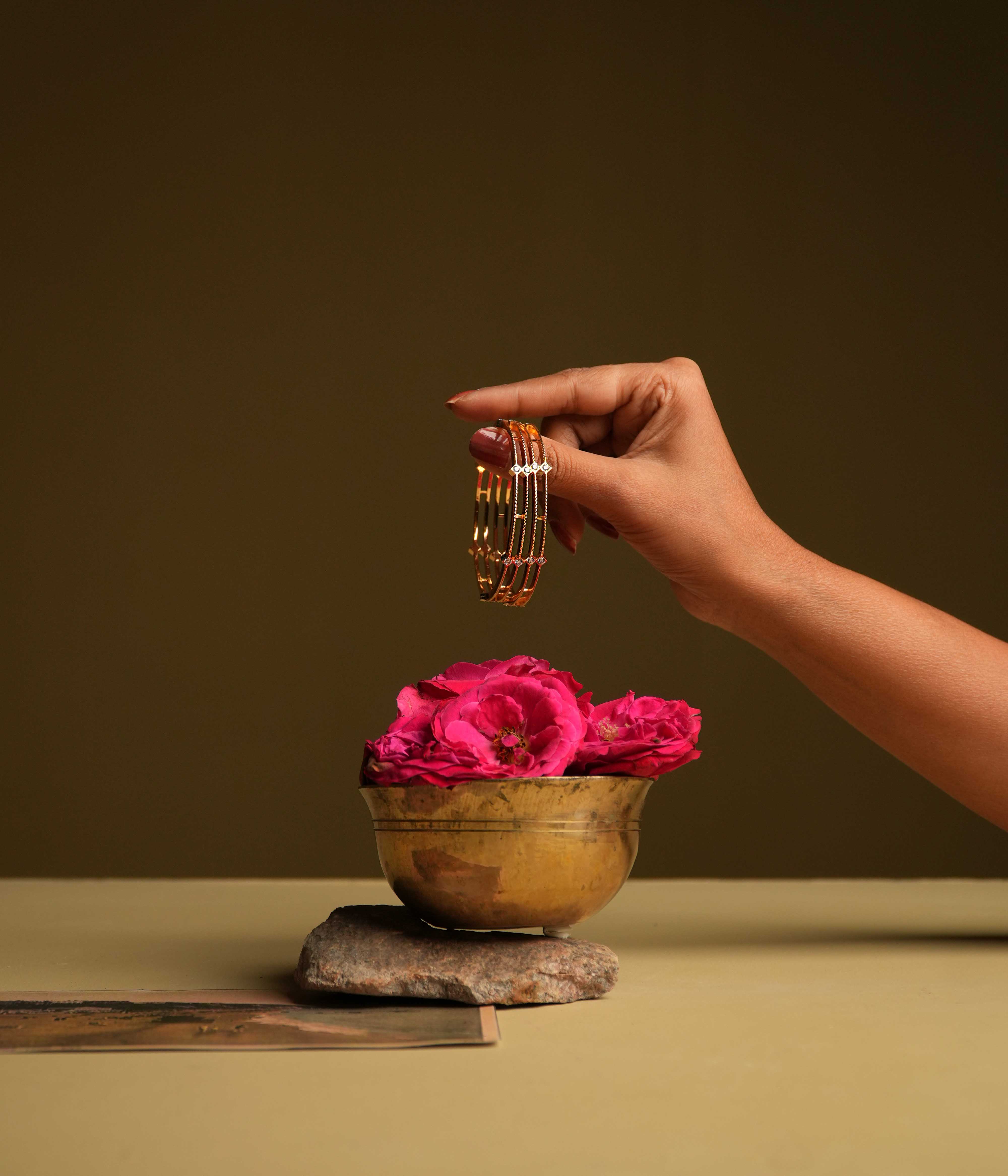 Handcrafted silver bangles with sparkling white stones in Chennai