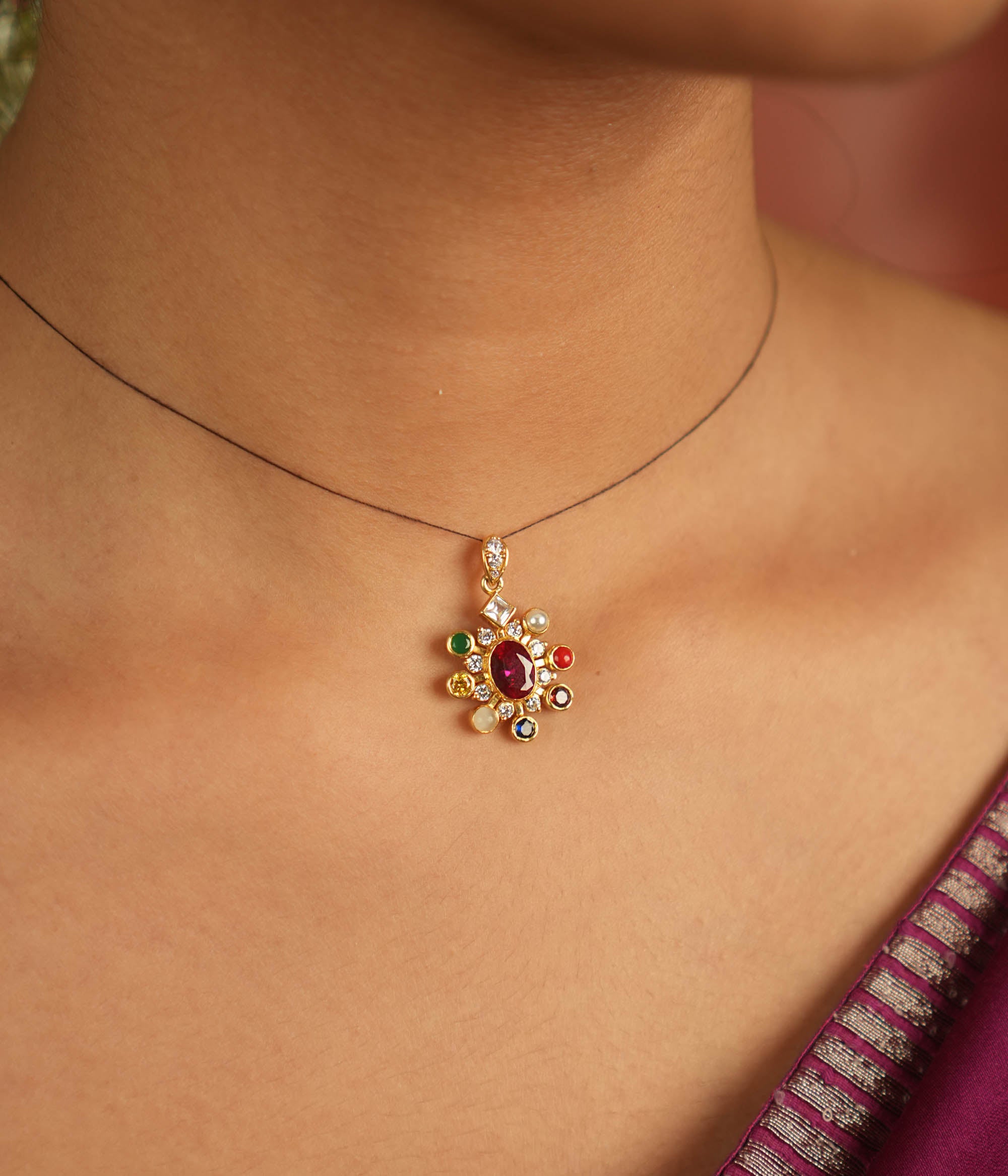 Handcrafted silver pendant with colorful Navratna stones and Polki
