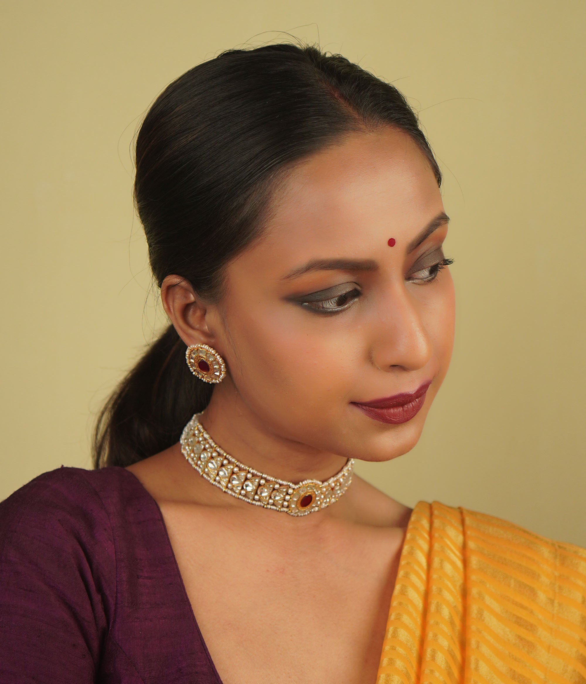 Handcrafted choker necklace with white and red kundan stones