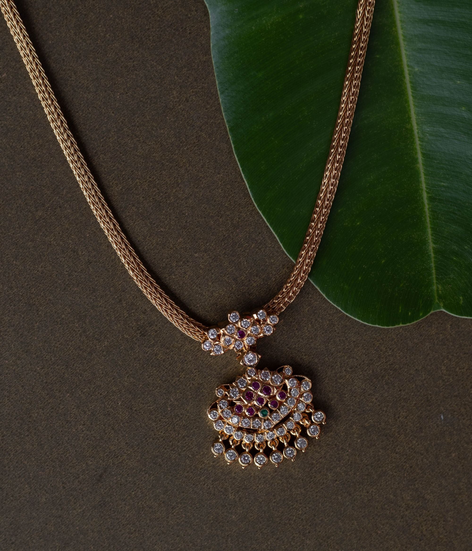 Exquisite handcrafted Necklace adorned with vibrant Swarovski , intricate work, and detailing for a royal elegance.