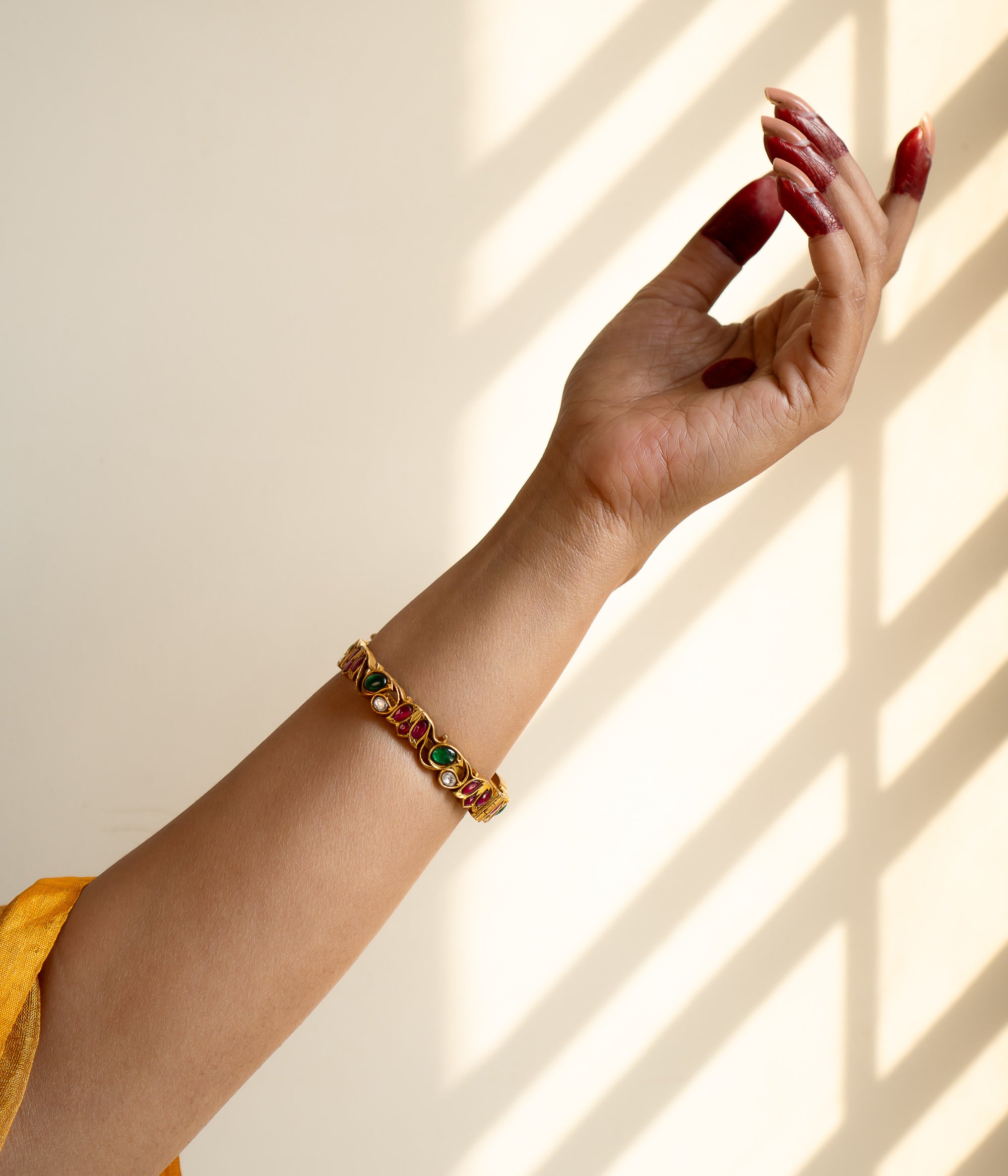 Handmade silver and gold plated screw type bangle with kundan stones
