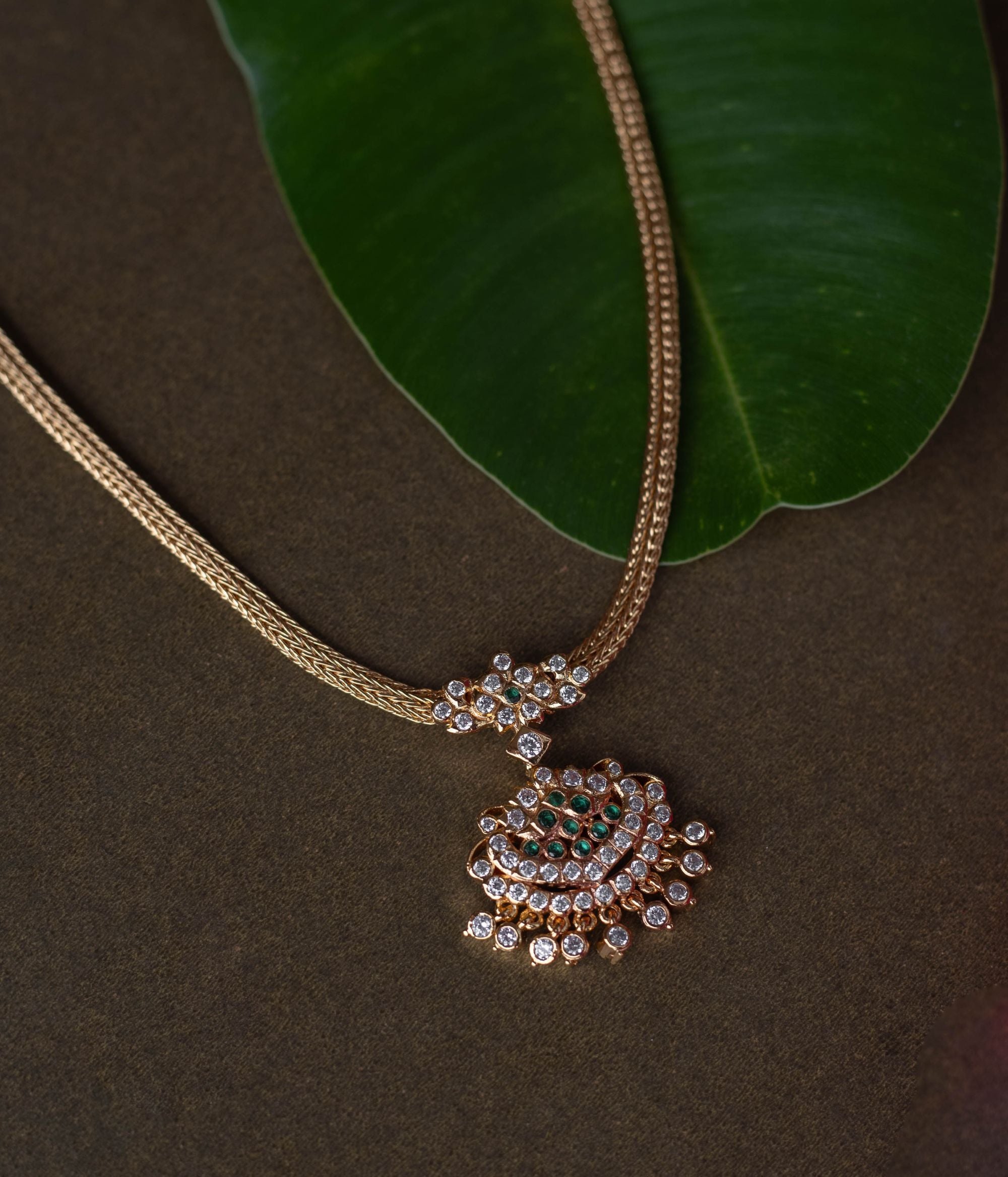 Exquisite handcrafted Necklace adorned with vibrant Swarovski , intricate work, and detailing for a royal elegance.