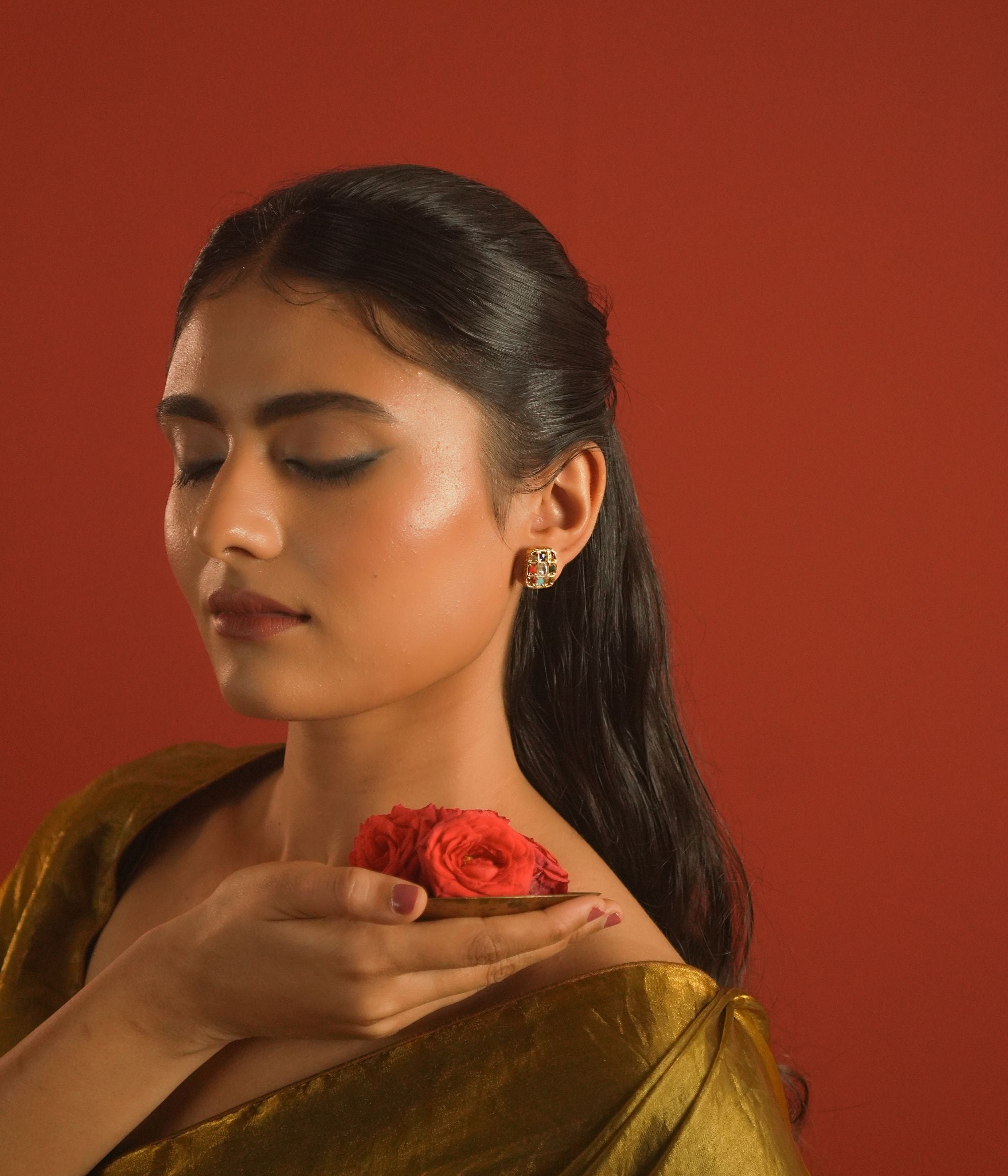Silver navratna stud earrings with nine colorful stones