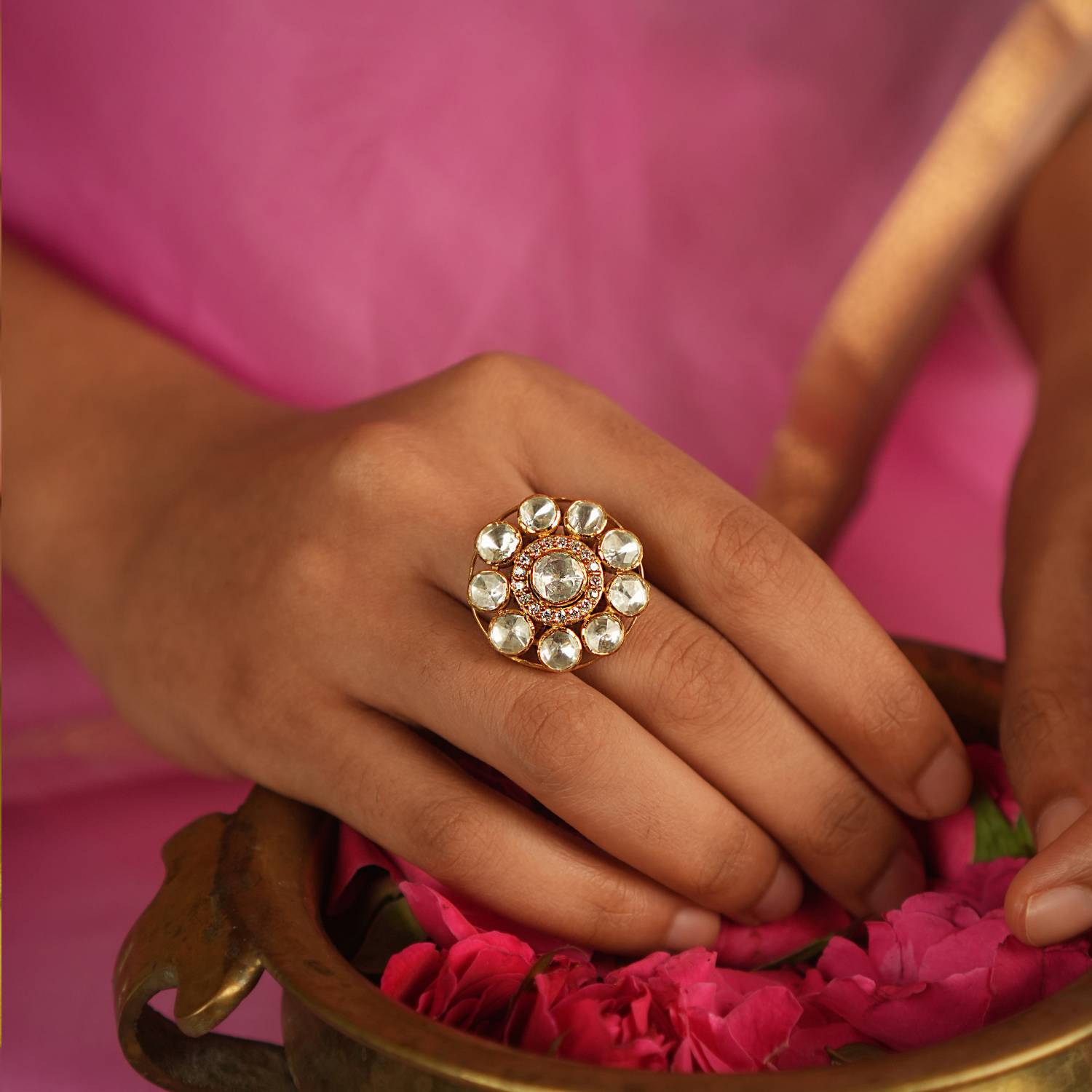 Step into timeless elegance with our round-shaped Moissanite Polki ring, featuring a beautiful blend of Polki and CZ stones. A true tribute to the craftsmanship of Mughal-era jewelry, this ring radiates vintage glamour and artistic finesse.