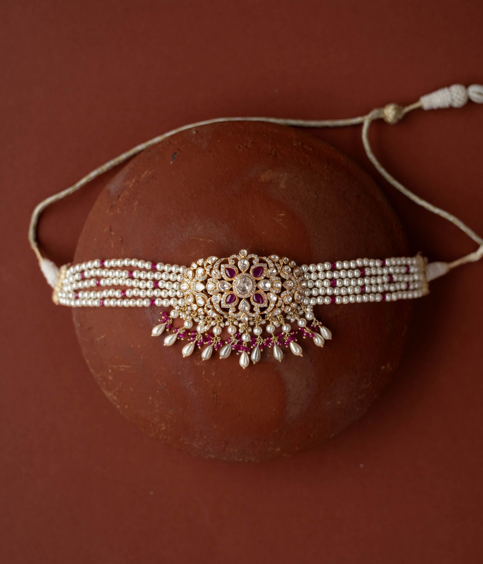 A regal masterpiece, the Neelam Choker, a symphony of Polki and sapphires , a timeless legacy.
