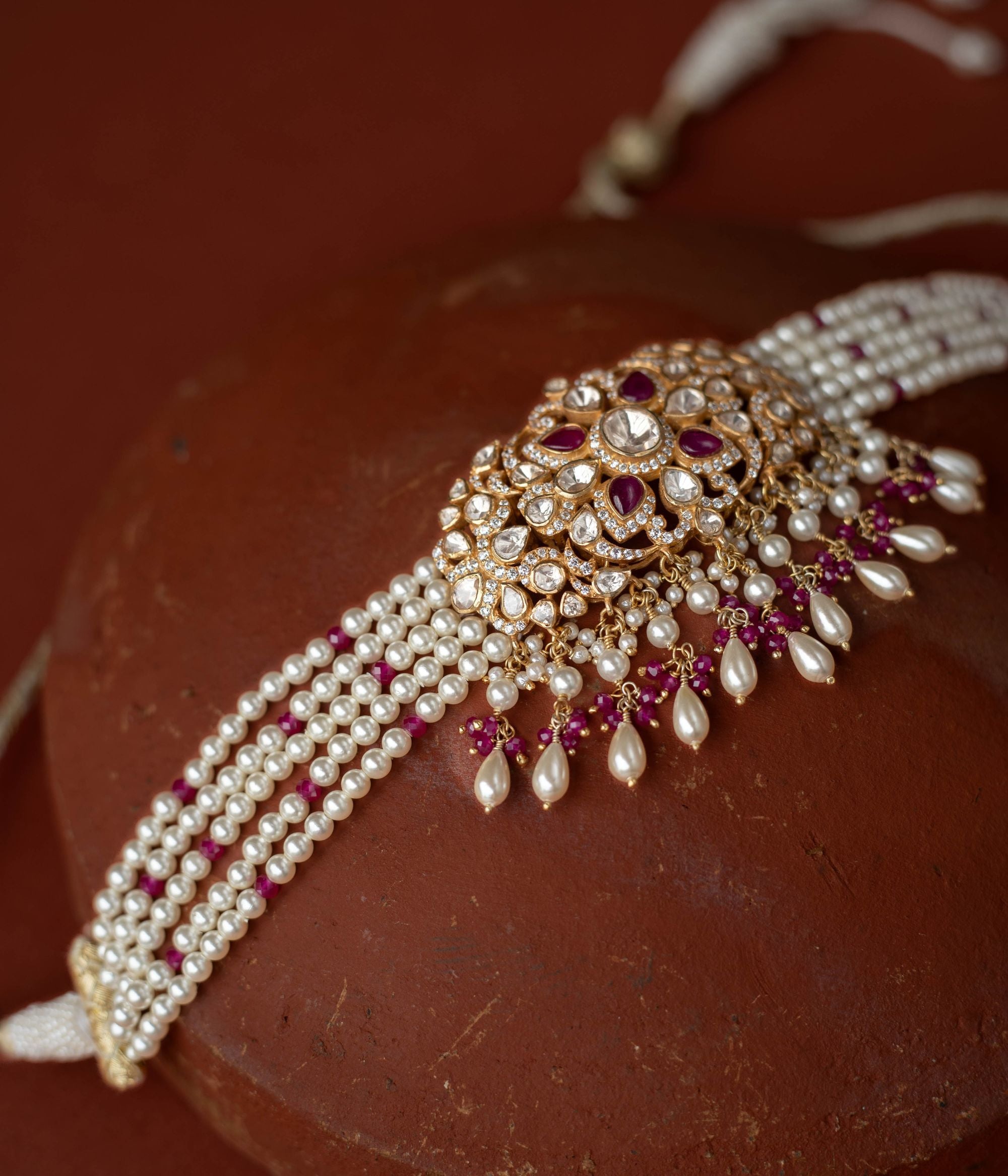 A regal masterpiece, the Neelam Choker, a symphony of Polki and sapphires , a timeless legacy.