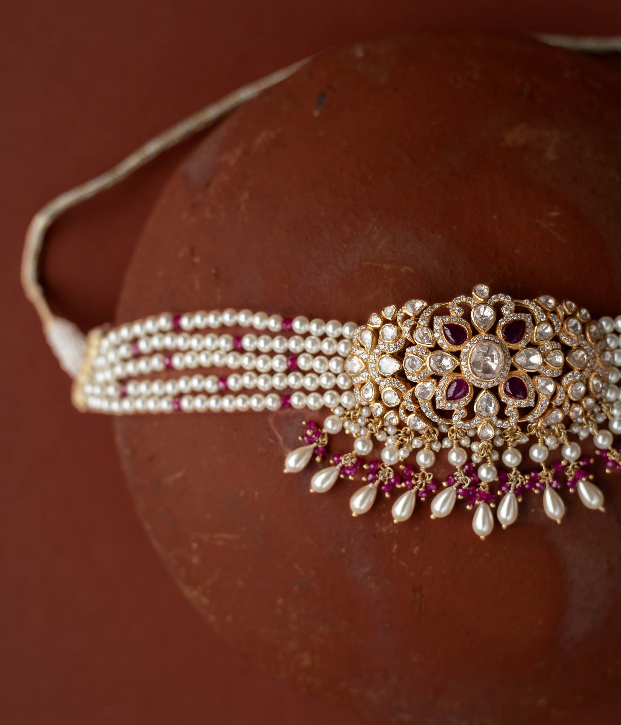 A regal masterpiece, the Neelam Choker, a symphony of Polki and sapphires , a timeless legacy.