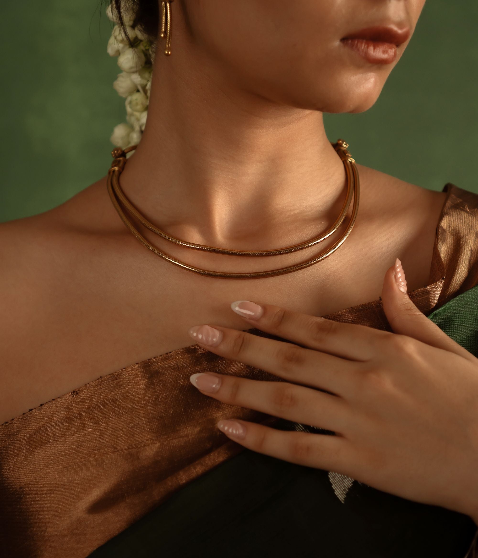Grace your neckline with effortless elegance, honoring the timeless charm of India’s tribal heritage, beautifully crafted in antique gold-plated silver.