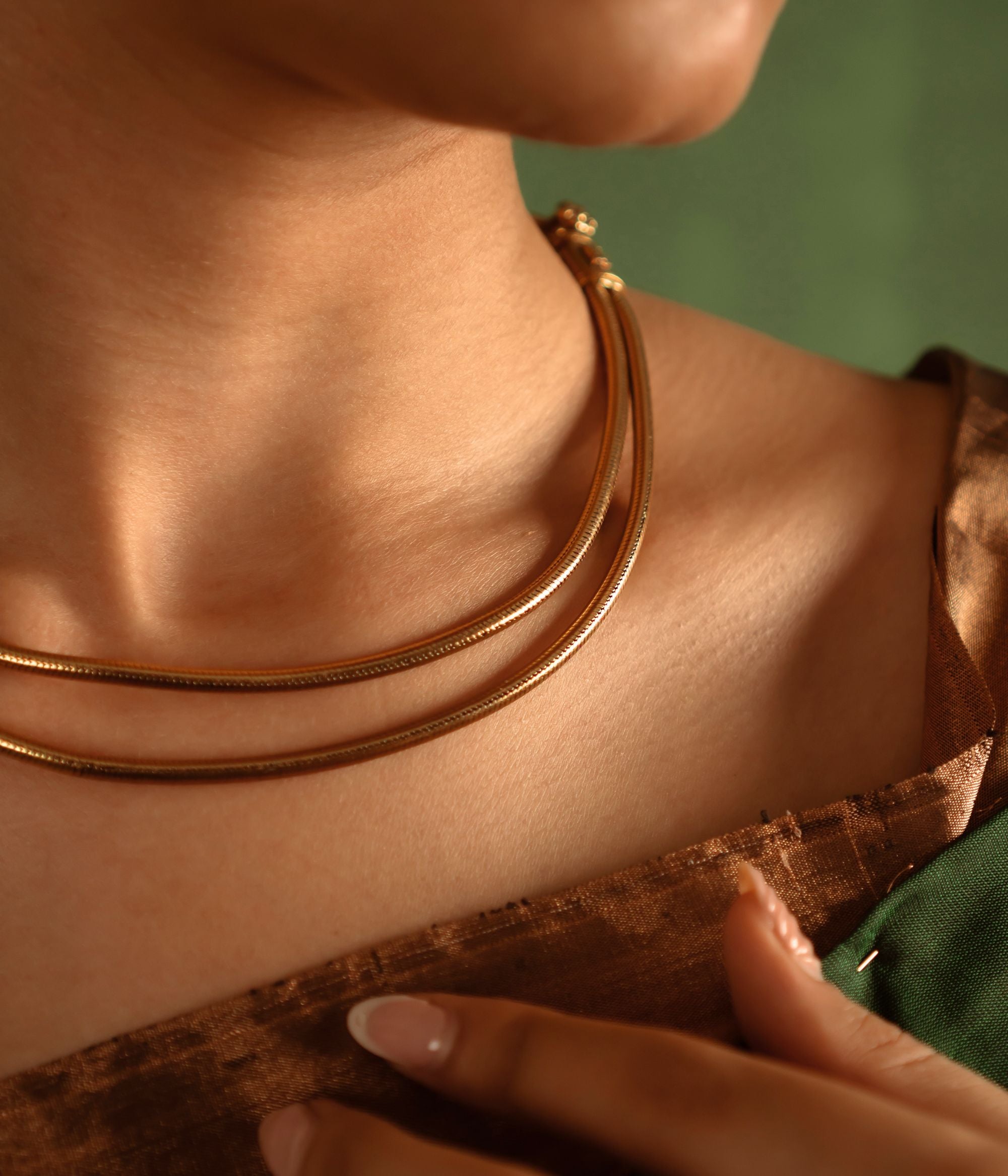 Grace your neckline with effortless elegance, honoring the timeless charm of India’s tribal heritage, beautifully crafted in antique gold-plated silver.