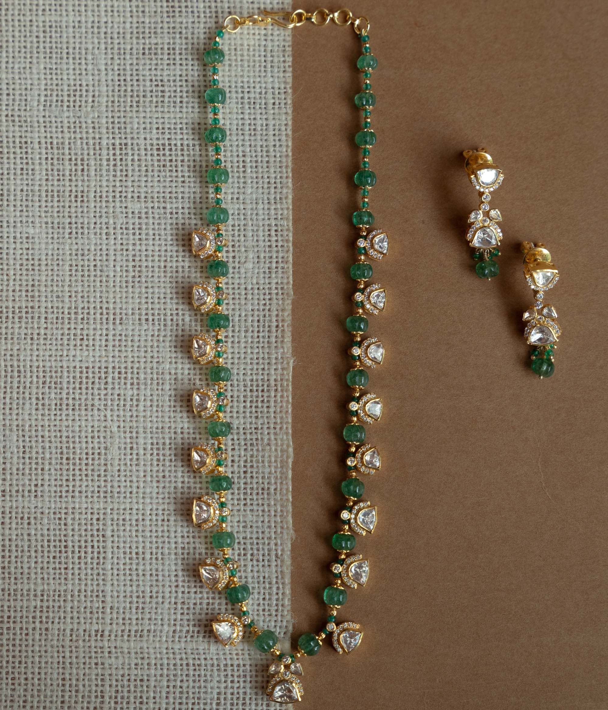 Ethnic silver necklace with white polki stones and coordinated green beads