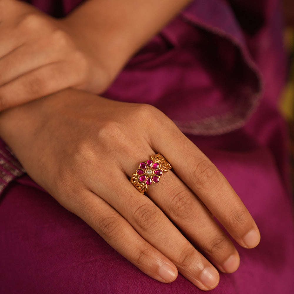 Vintage whispers reborn! Antique gold-plated ring adorned with kundan floral blooms, radiating nature’s grace and timeless charm.