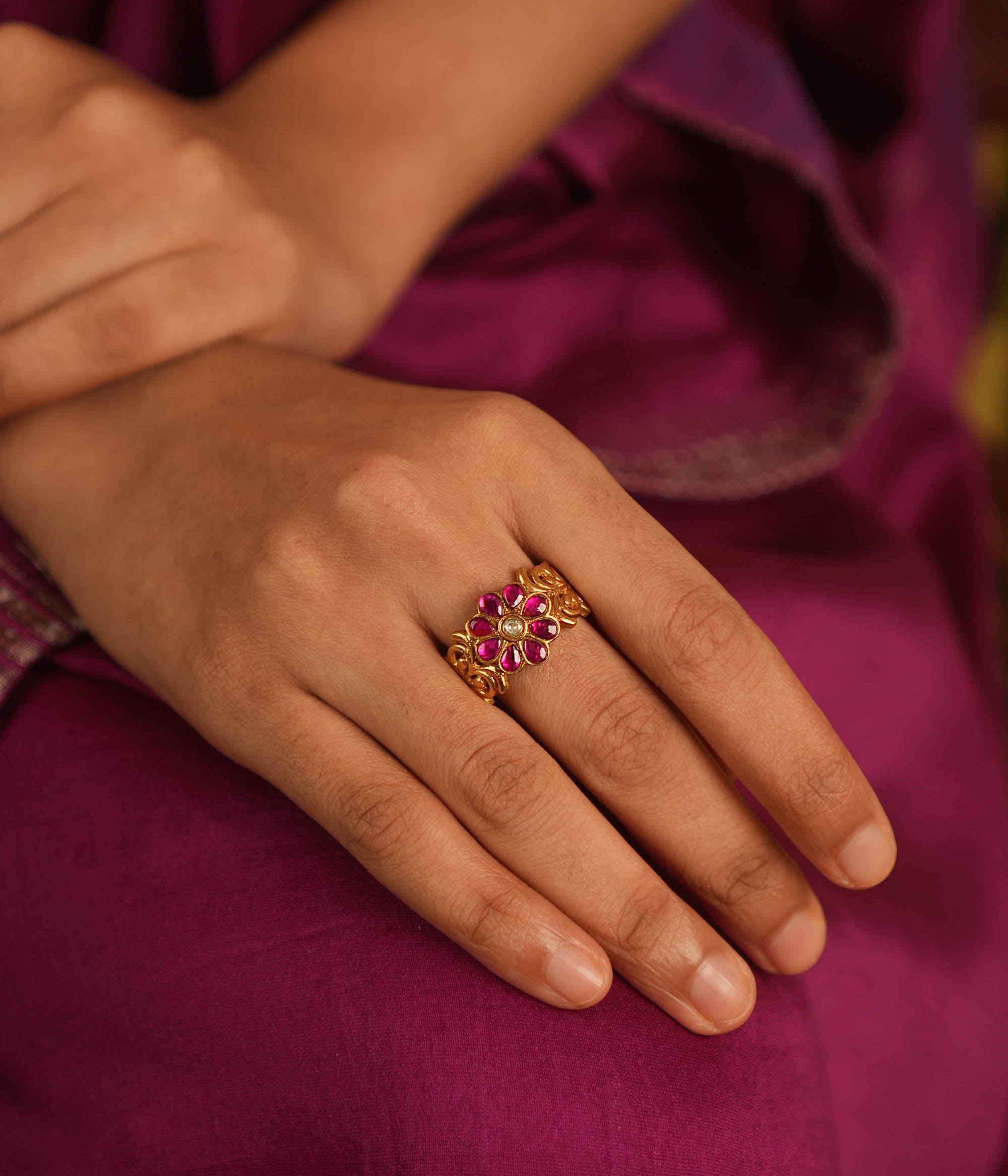 Vintage whispers reborn! Antique gold-plated ring adorned with kundan floral blooms, radiating nature’s grace and timeless charm.