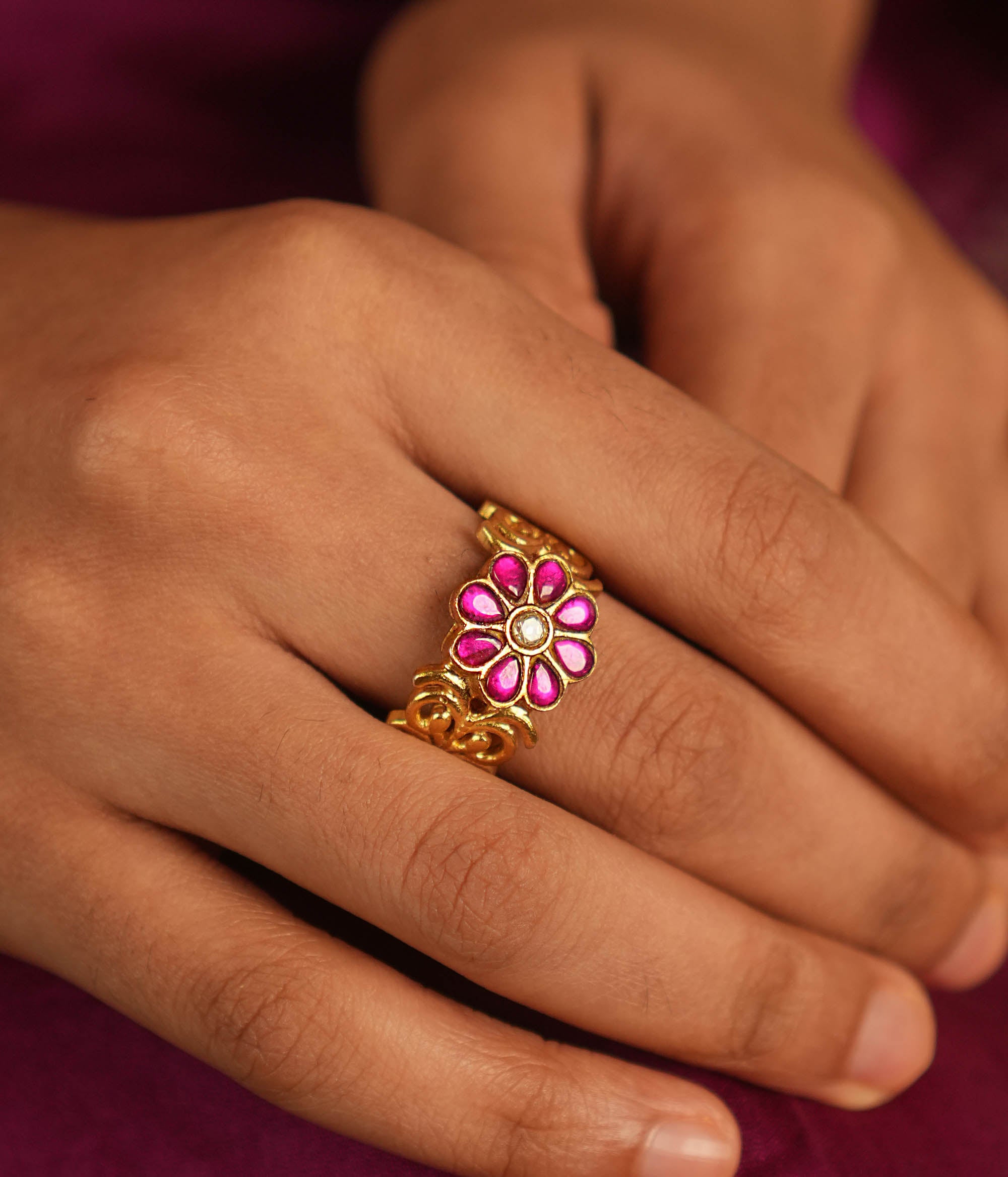 Vintage whispers reborn! Antique gold-plated ring adorned with kundan floral blooms, radiating nature’s grace and timeless charm.