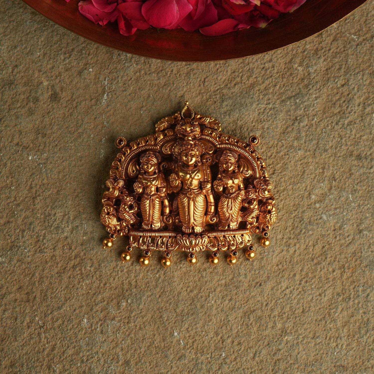 At the core of this gold-plated silver pendant, a divine tableau unfolds—Lord Ram, Sita, and Lakshman captured in a moment of eternal devotion and serenity.