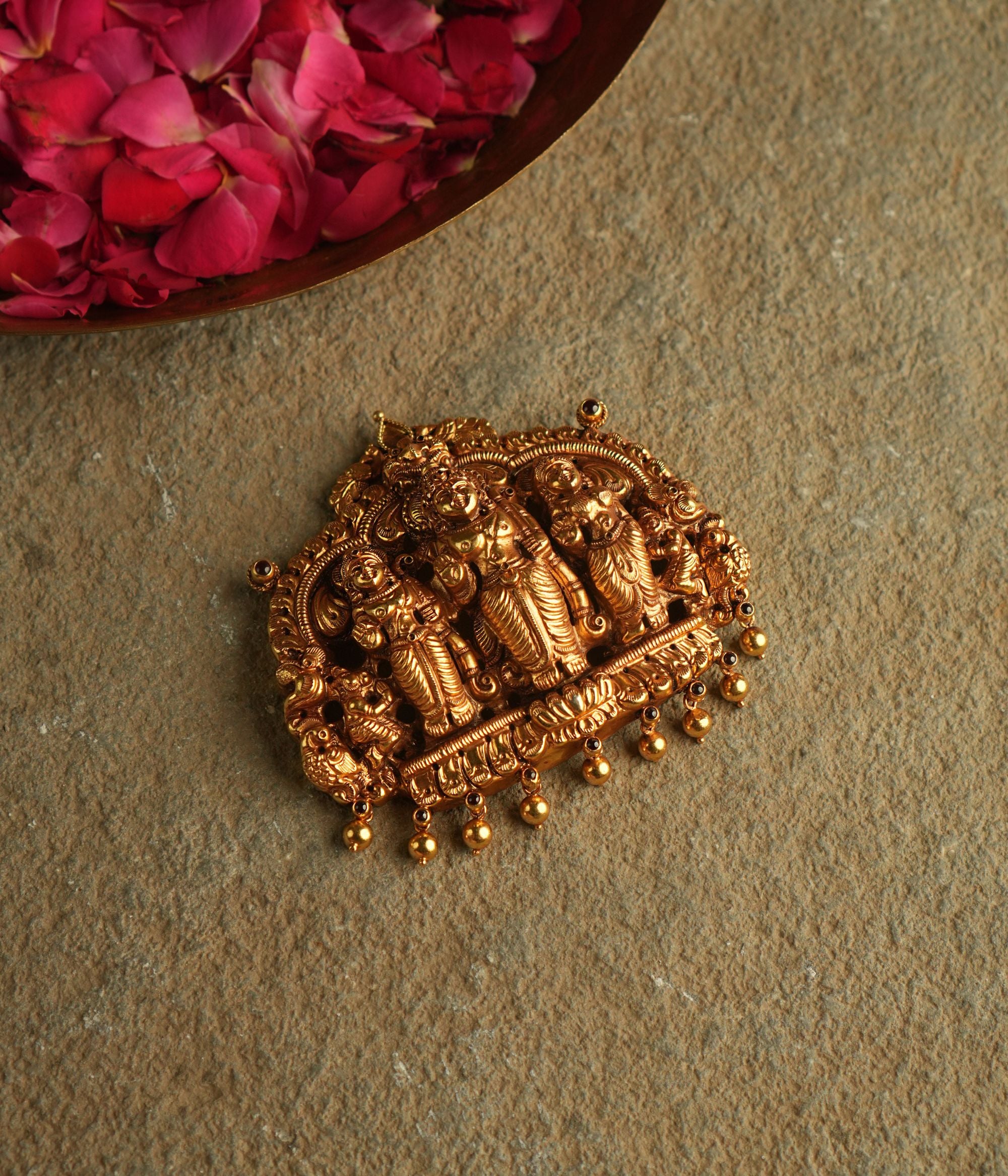 At the core of this gold-plated silver pendant, a divine tableau unfolds—Lord Ram, Sita, and Lakshman captured in a moment of eternal devotion and serenity.