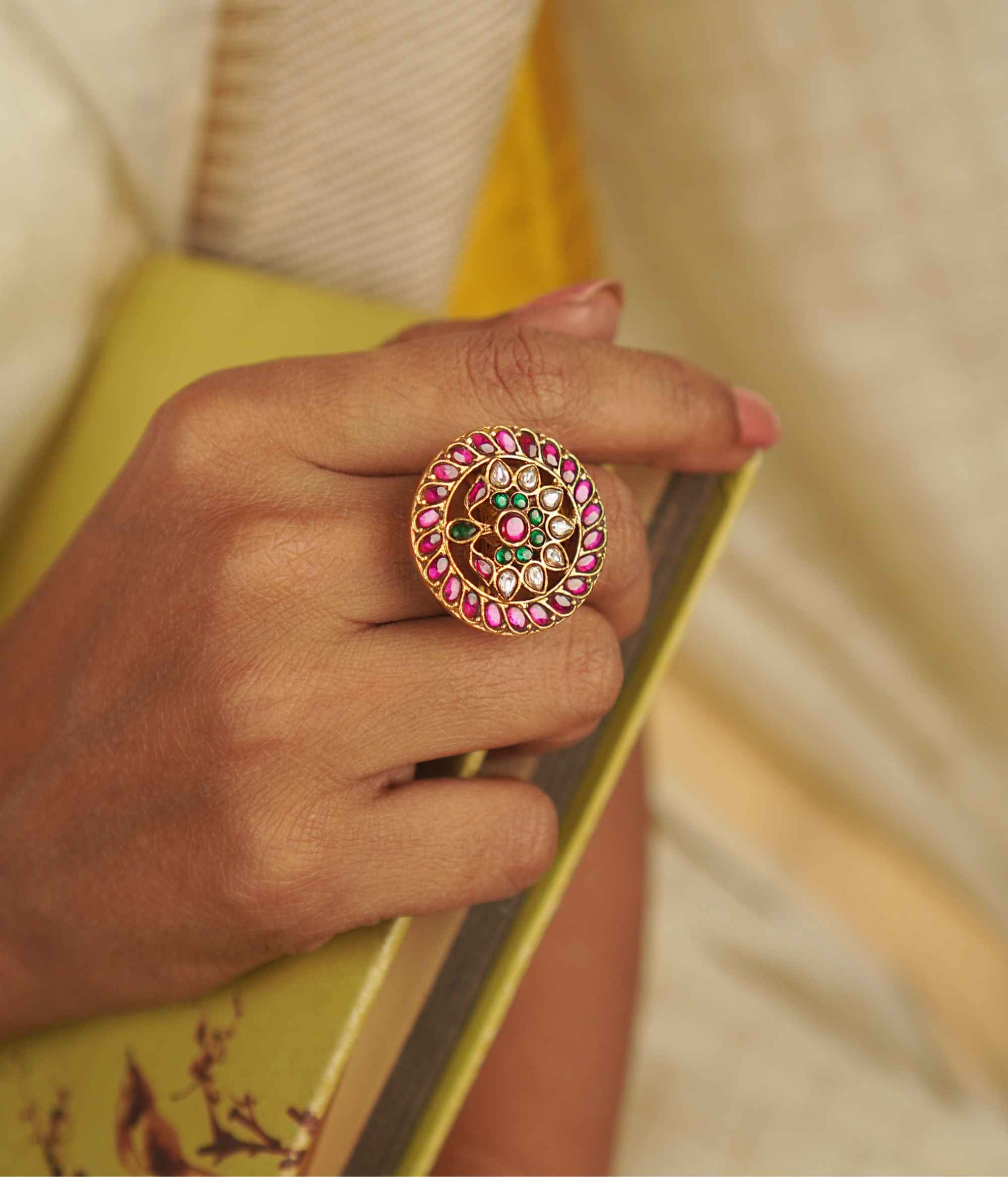 Roshandra Ring: A rediscovered gem. Gold-plated silver with vibrant red, white, and green kundans, capturing the allure of a timeless era.