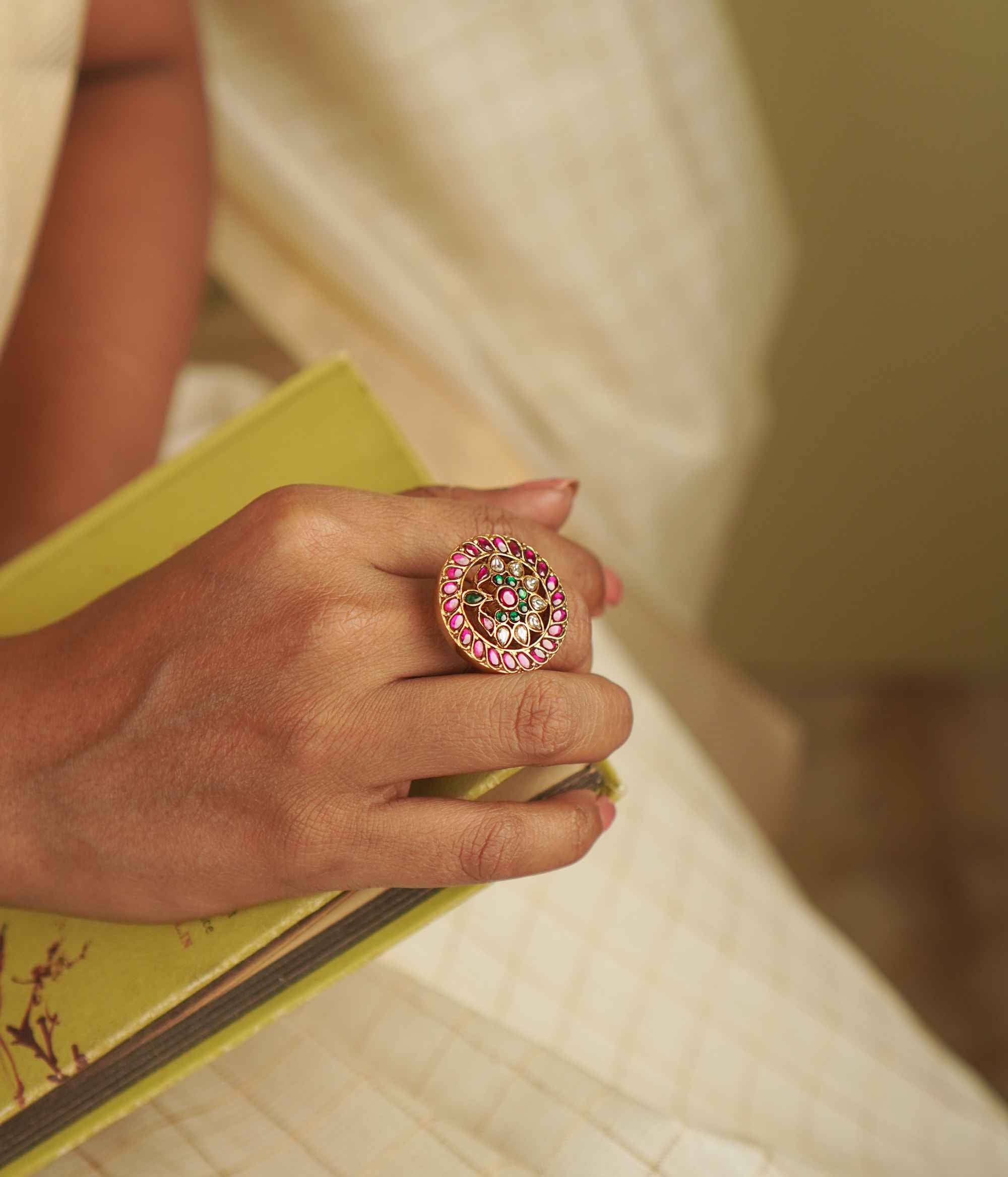 Roshandra Ring: A rediscovered gem. Gold-plated silver with vibrant red, white, and green kundans, capturing the allure of a timeless era.