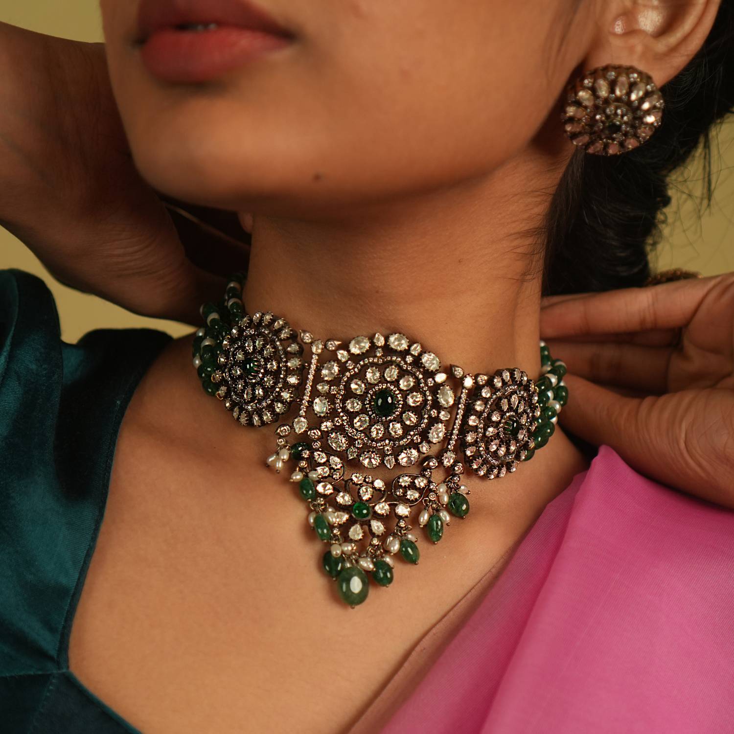 Each meticulously set Polki gemstone in this choker echoes the artistry of a bygone era, embodying the essence of regal elegance and timeless charm.