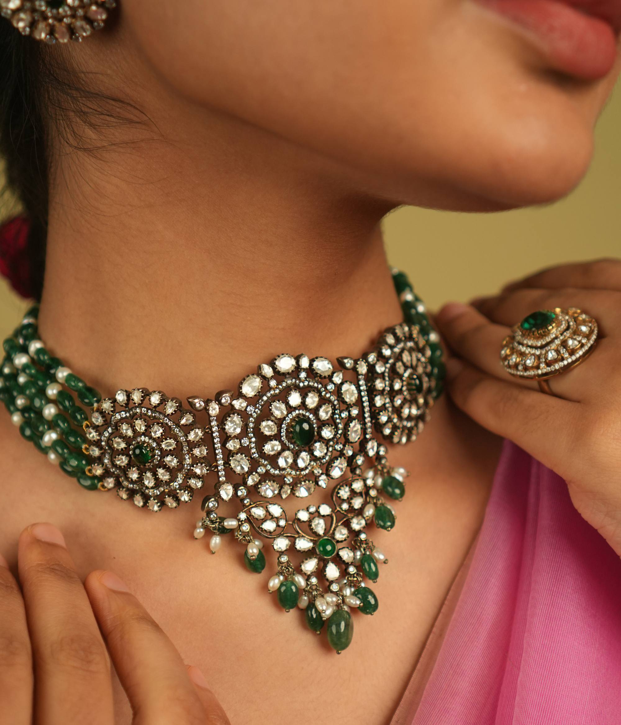 Each meticulously set Polki gemstone in this choker echoes the artistry of a bygone era, embodying the essence of regal elegance and timeless charm.
