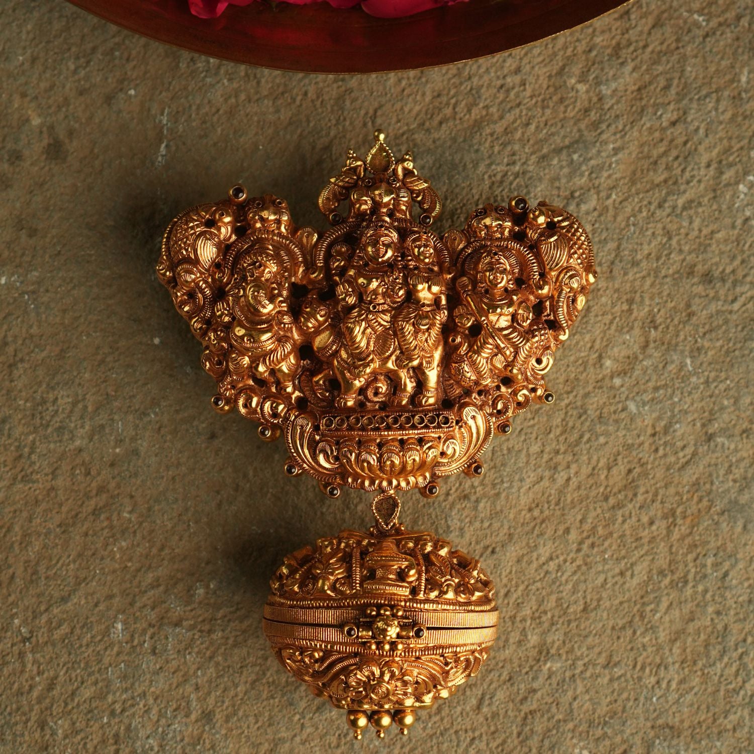 In the sacred aura of this gold-plated silver pendant, Lord Shiva and Goddess Parvati stand in divine harmony, their celestial union representing the eternal balance of the cosmos.