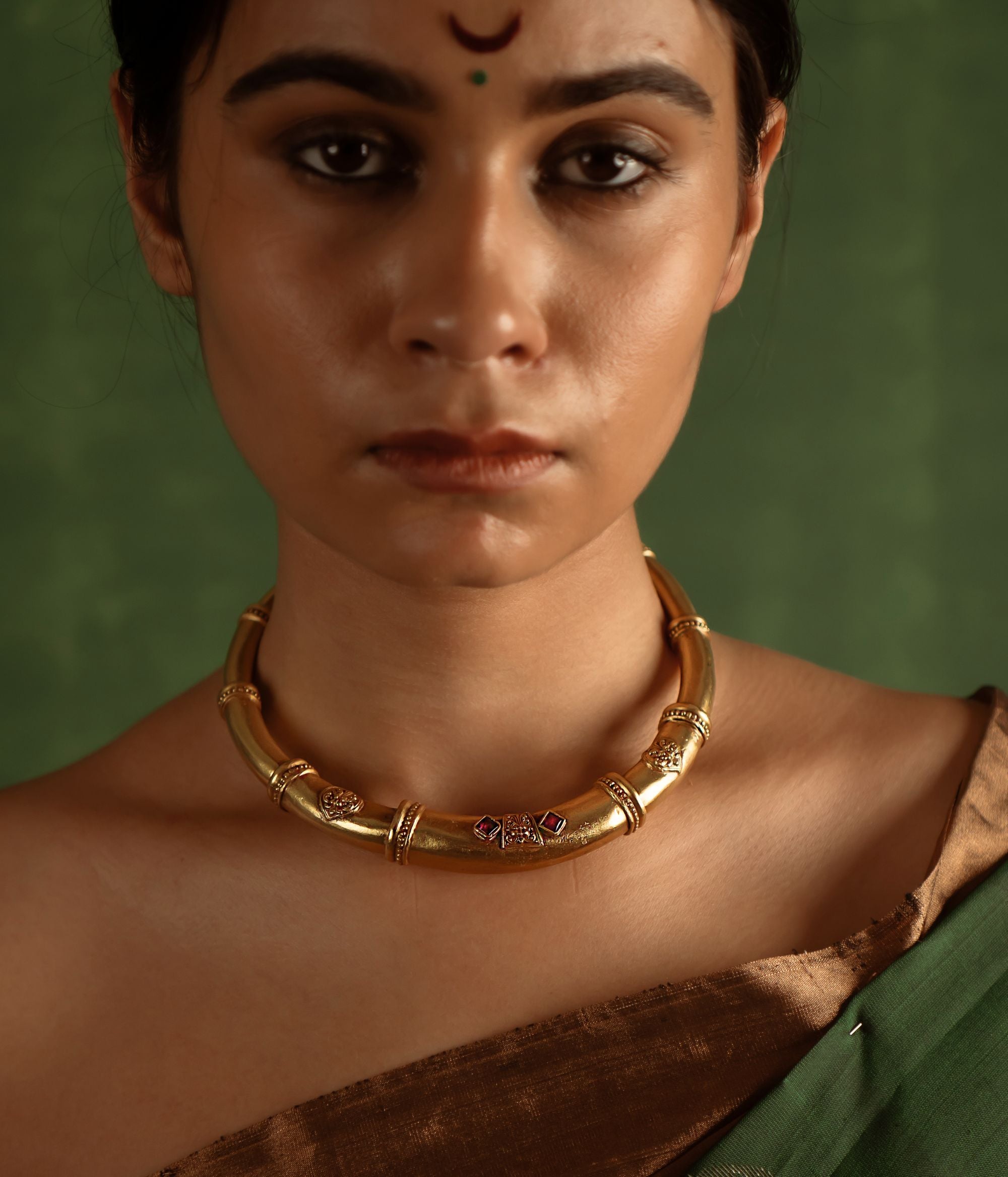Tribal elegance reimagined! The Shaleena necklace (gold-plated silver) exudes timeless beauty across three delicate layers, offering effortless grace for the modern woman.
