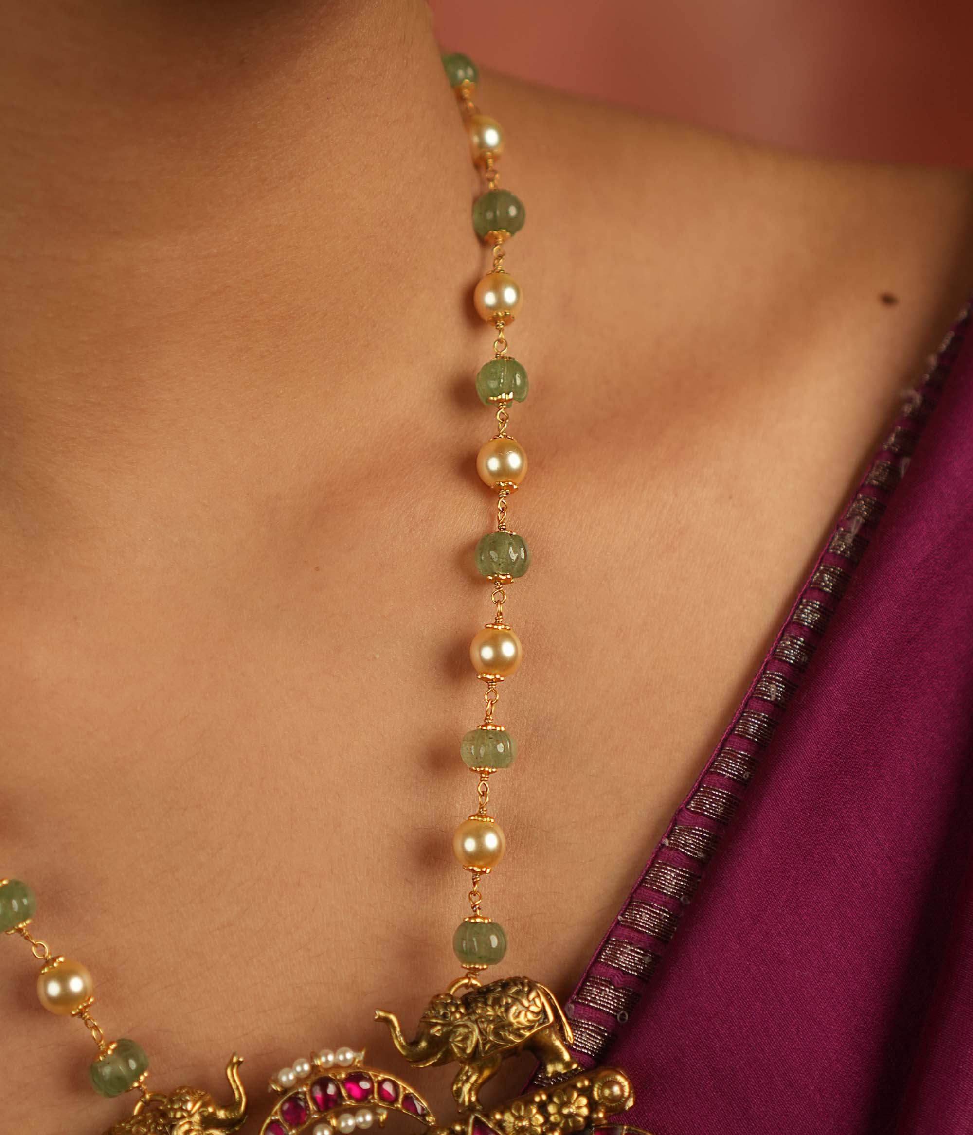 Regal menagerie reborn! Kundan necklace with peacock and elephant motifs whispers tales of opulence through vibrant hues—a timeless treasure.