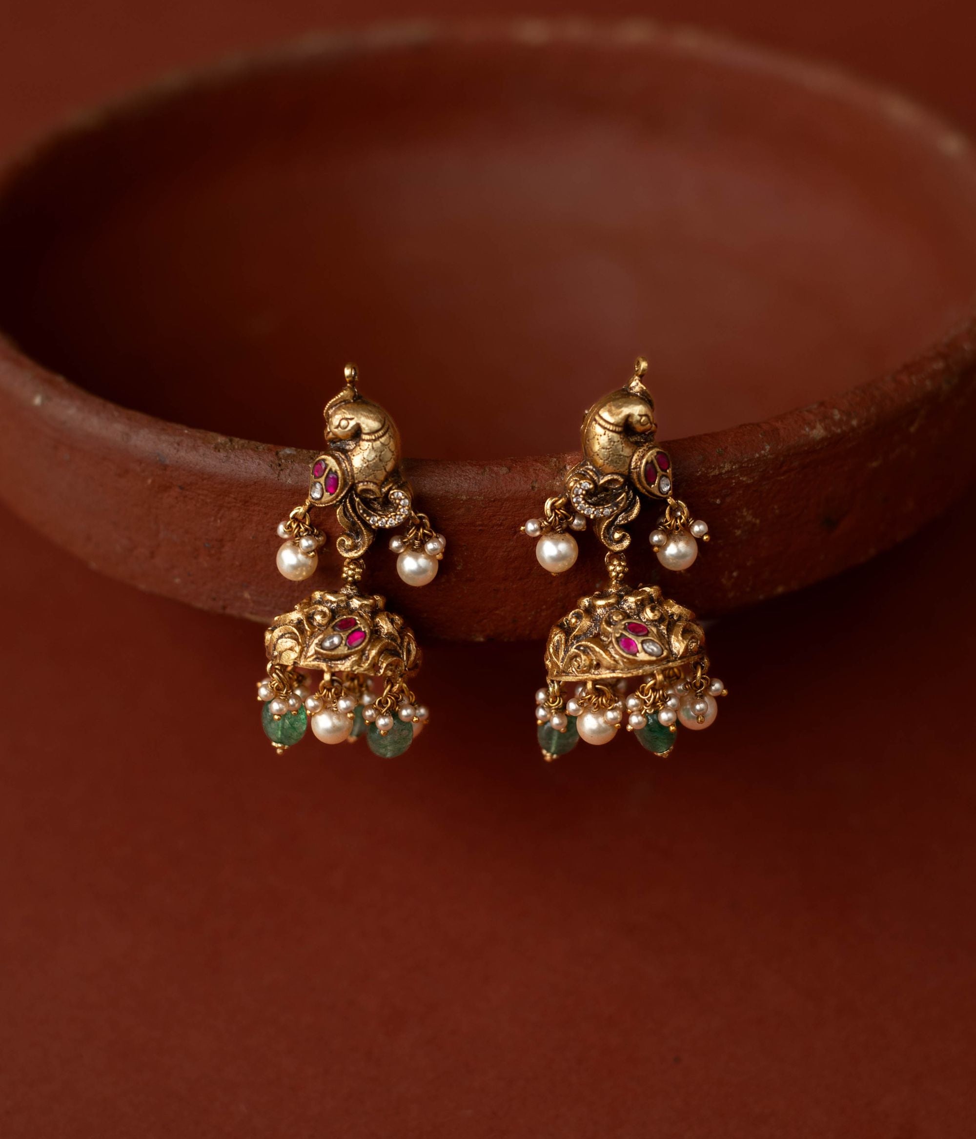 Traditional 925 silver temple earrings with green beads and pearls