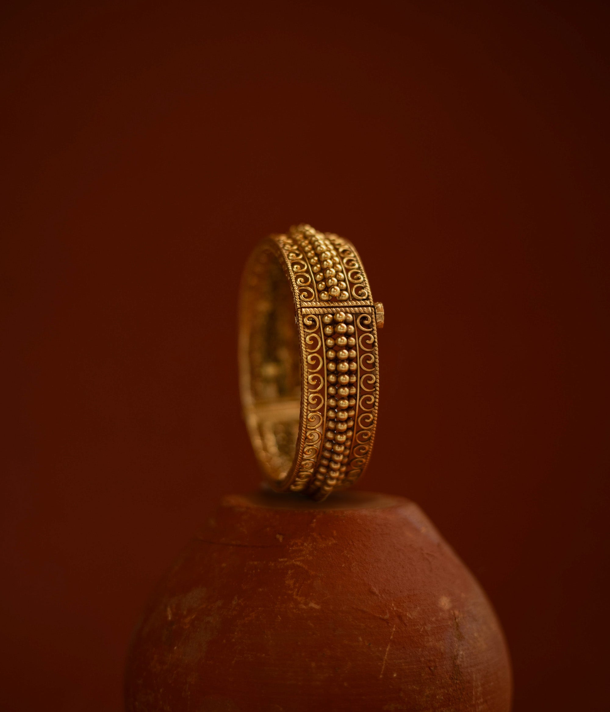 Handcrafted Avery Kada bangle with antique gold detailing