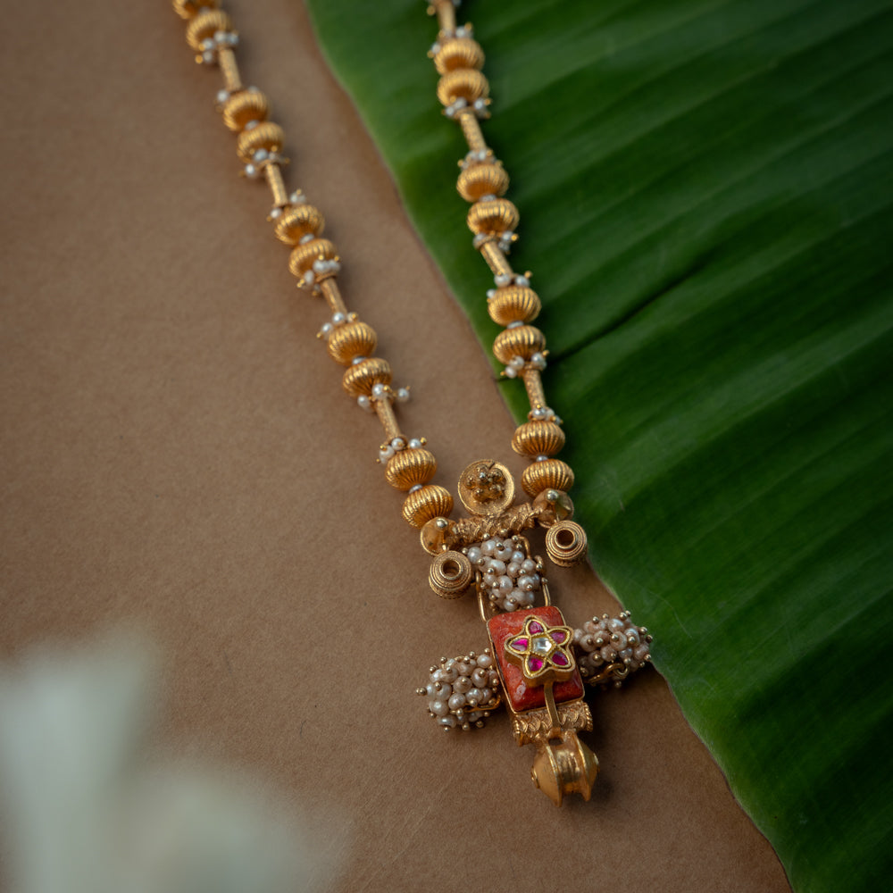 Trible Necklace with Red Kundan Stone, White Kundan Stone and Preals., themed around Garuda.