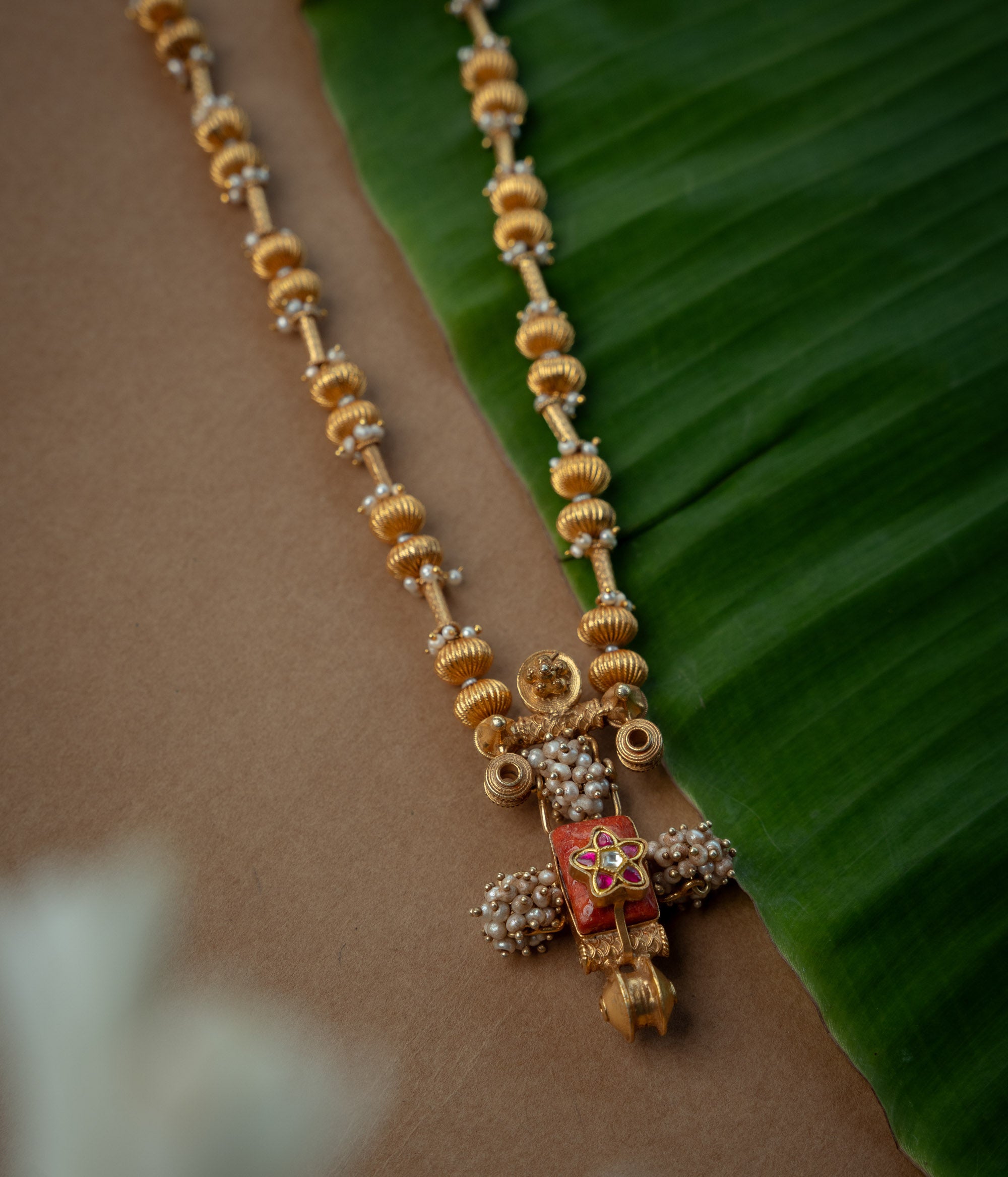 Trible Necklace with Red Kundan Stone, White Kundan Stone and Preals., themed around Garuda.