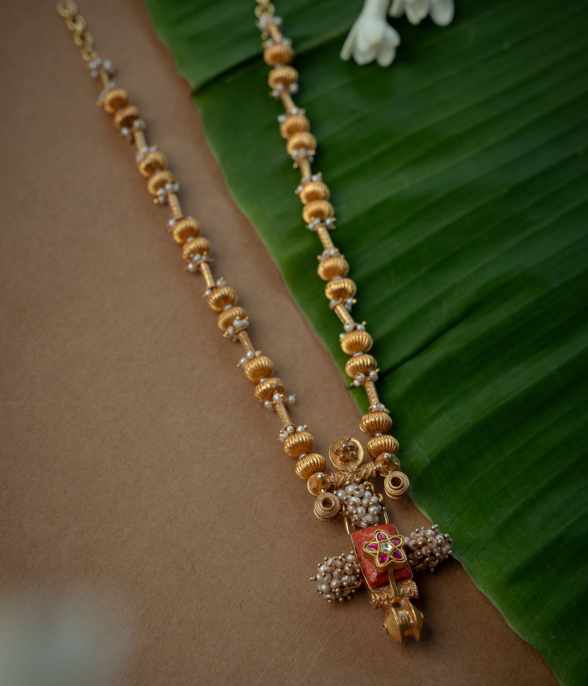 Trible Necklace with Red Kundan Stone, White Kundan Stone and Preals., themed around Garuda.