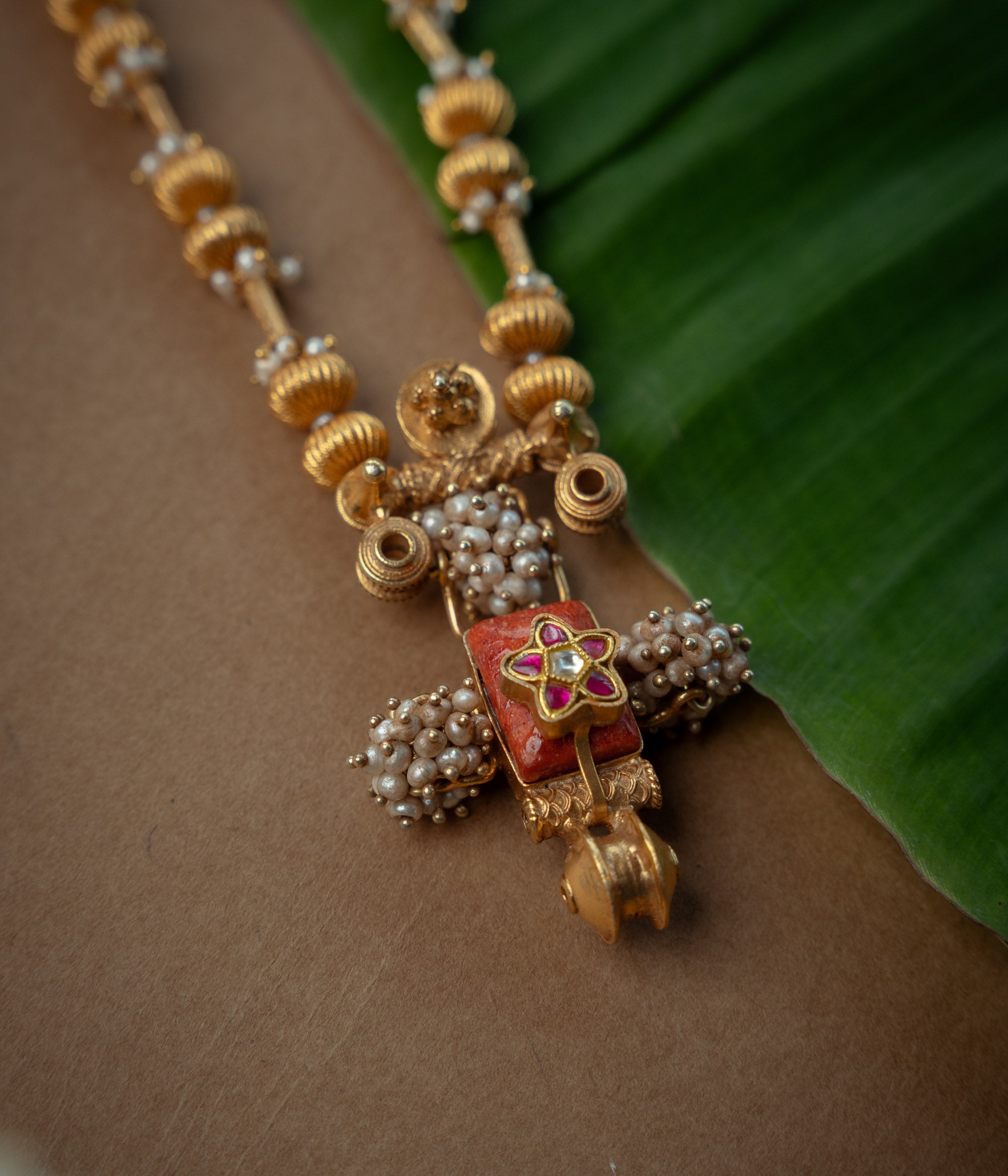Trible Necklace with Red Kundan Stone, White Kundan Stone and Preals., themed around Garuda.