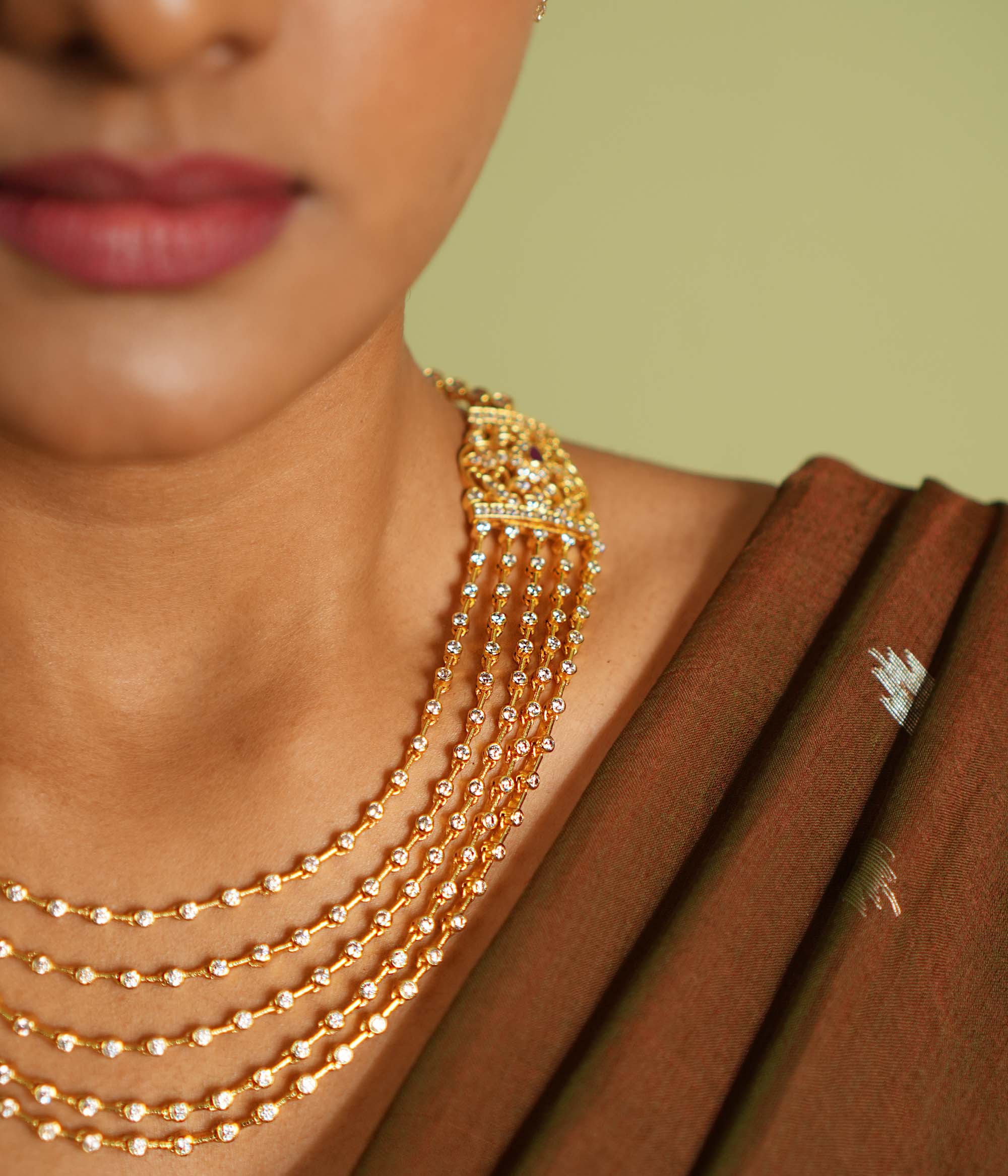 Close view of Taasha necklace red cut and CZ stone work
