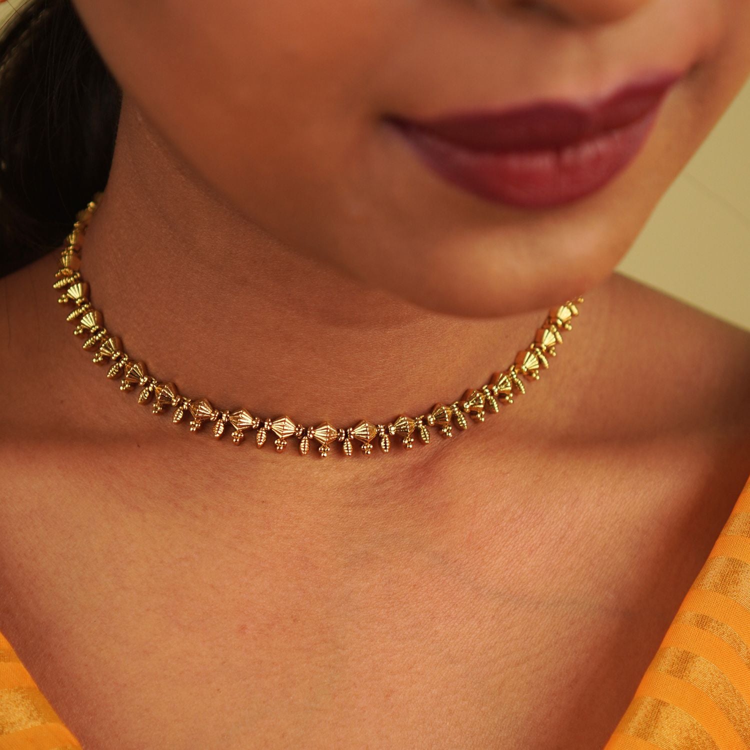 The delicate Ukti necklace seamlessly blends vintage charm with modern elegance, making it a timeless addition to any attire, perfect for every occasion.