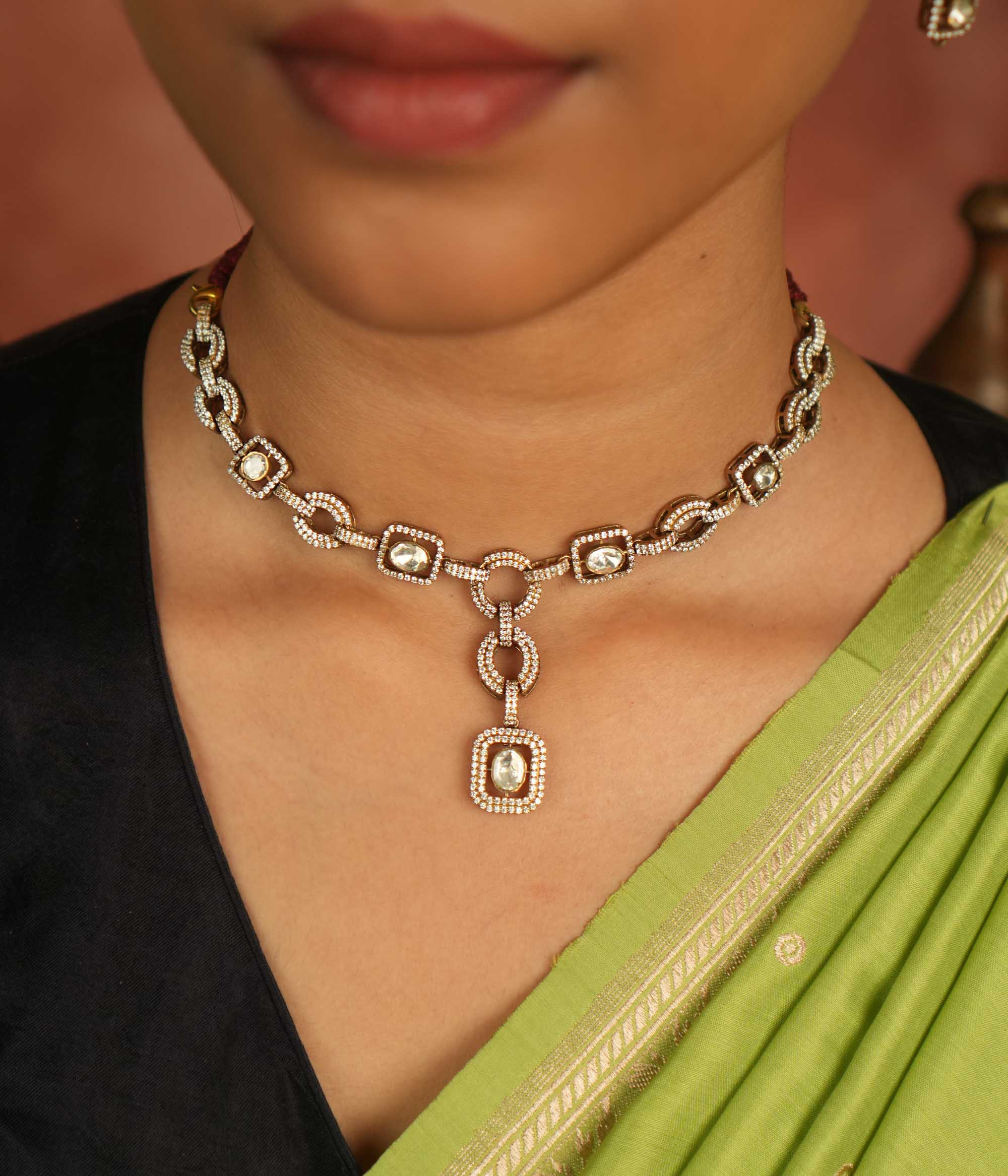 Geometric whispers reborn! This Polki and CZ stone necklace radiates modern elegance, a timeless expression of luxury for the minimalist connoisseur.