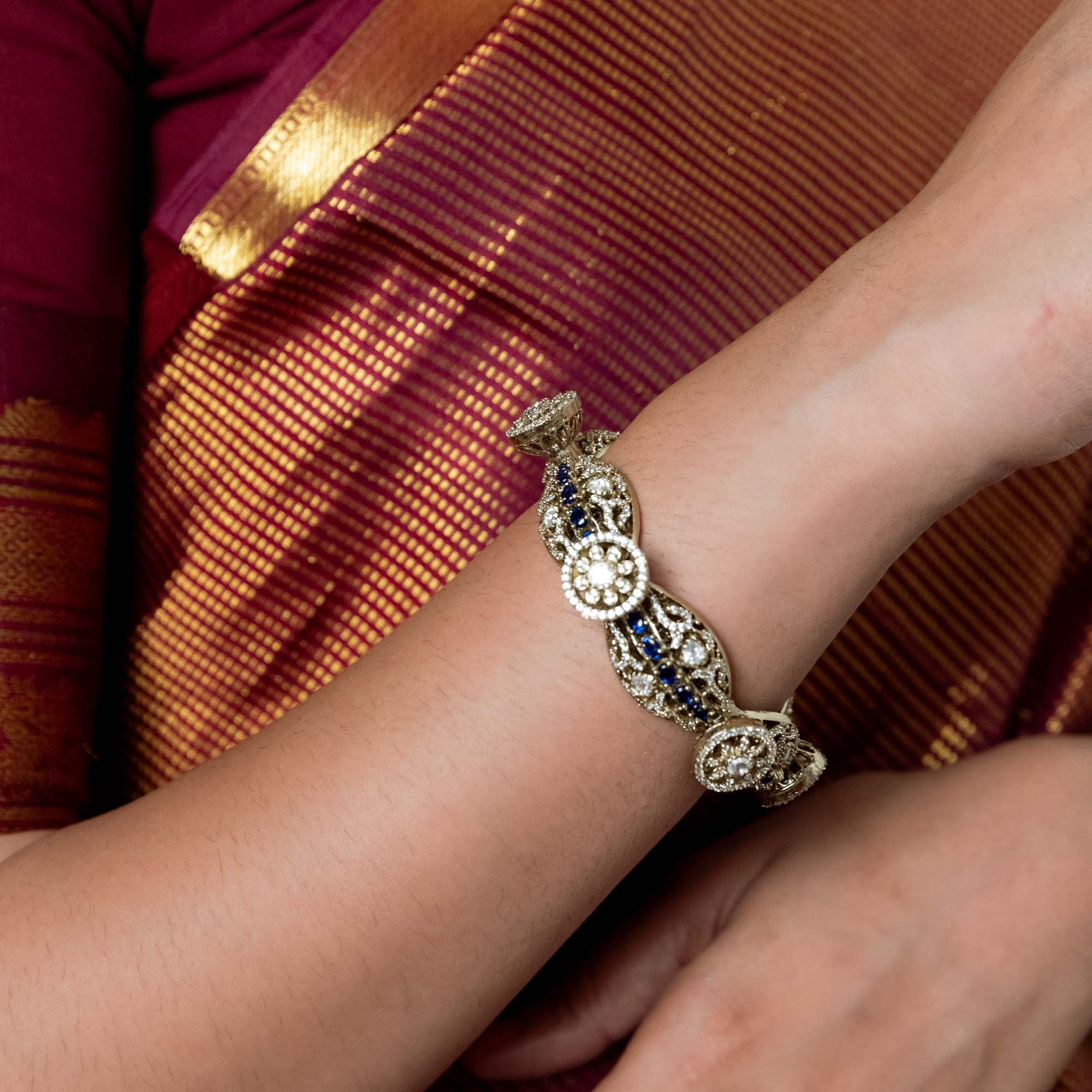 Victorian-style bangle adorned with Polki and CZ stones. Seamlessly blends classic elegance with contemporary flair.