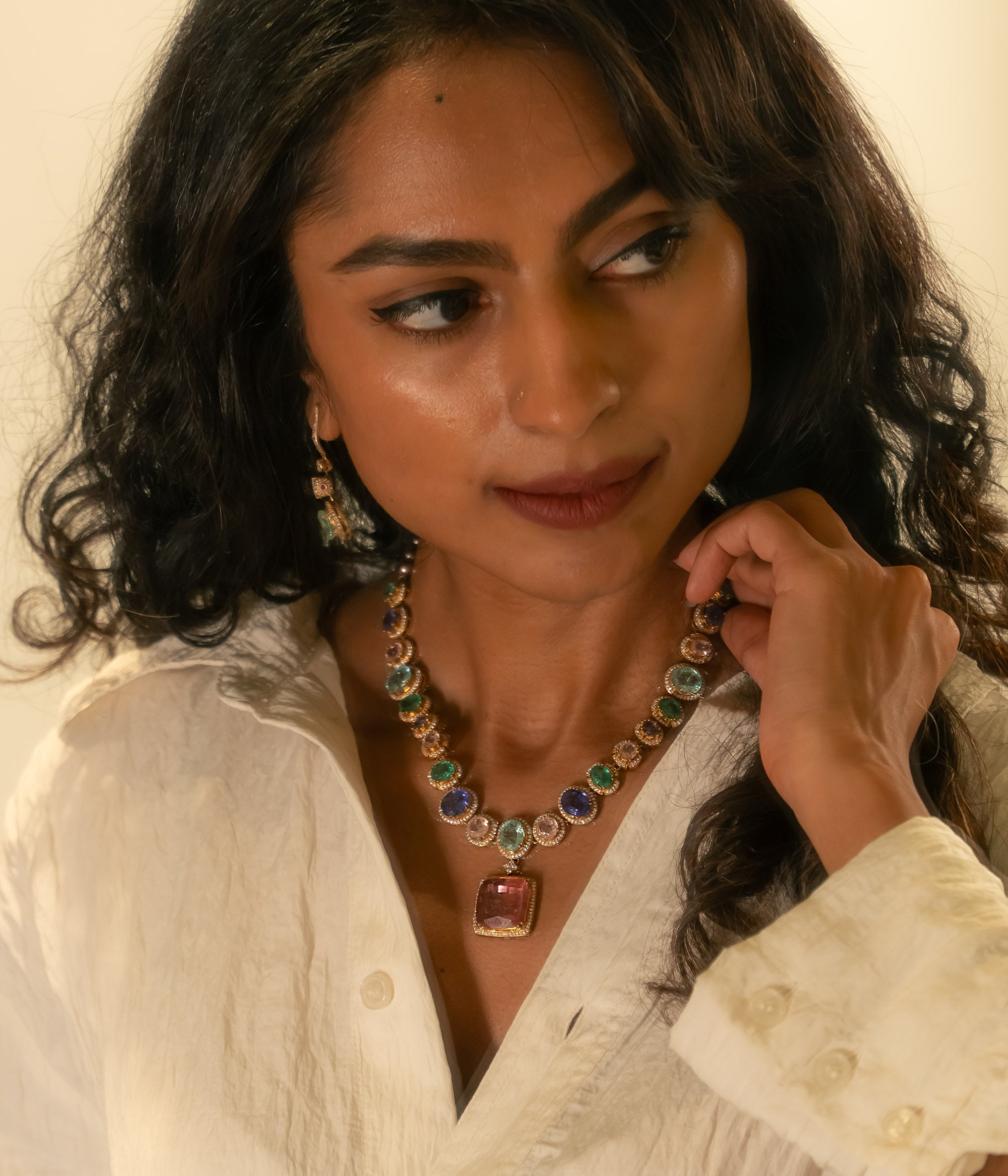 Victorian-style necklace with colorful gemstones, Moissanite Polki, and red central pendant.