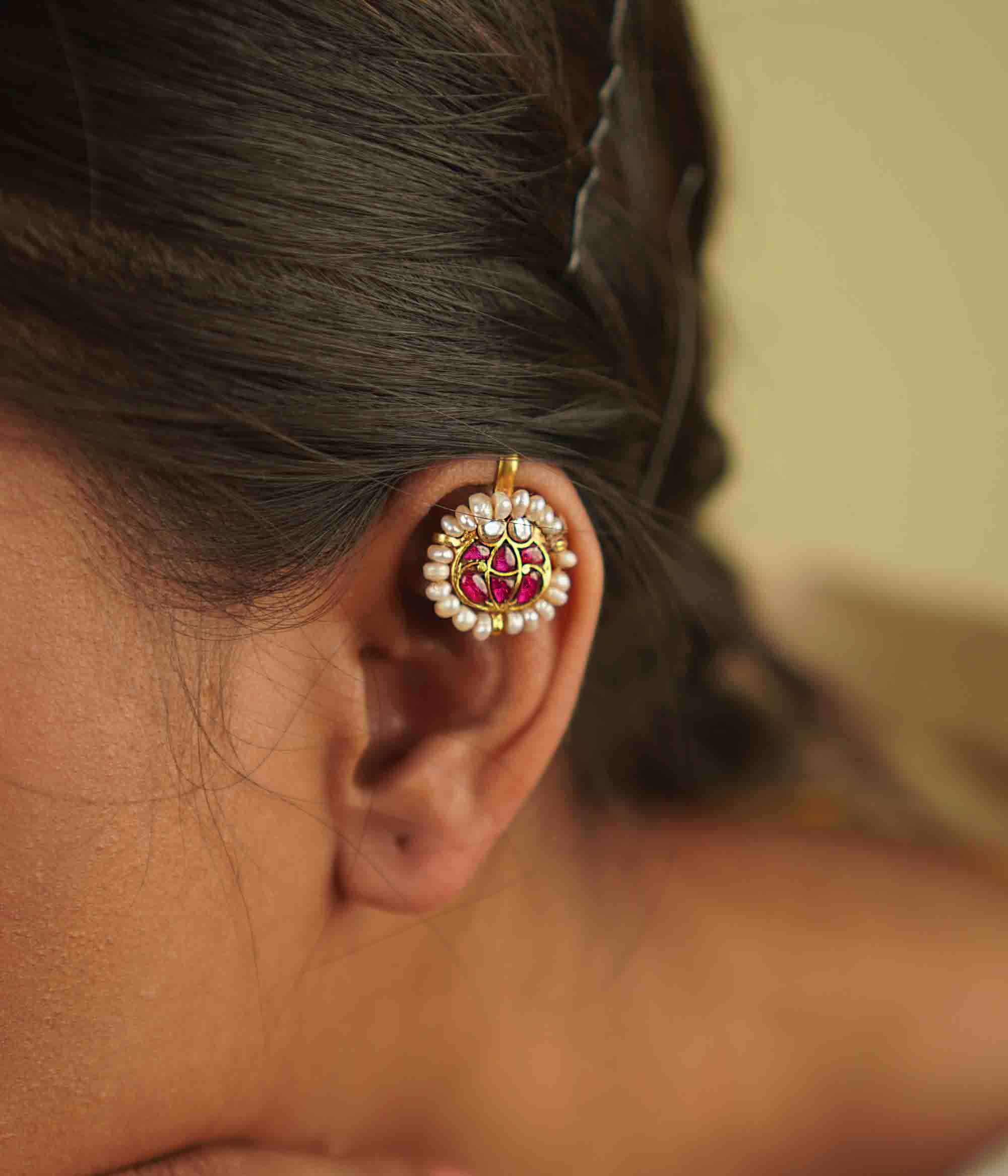 Golden radiance! Varali Bugadi: Delicate gold bars adorned with pink kundan florals and pearls, exuding timeless elegance with a modern touch.