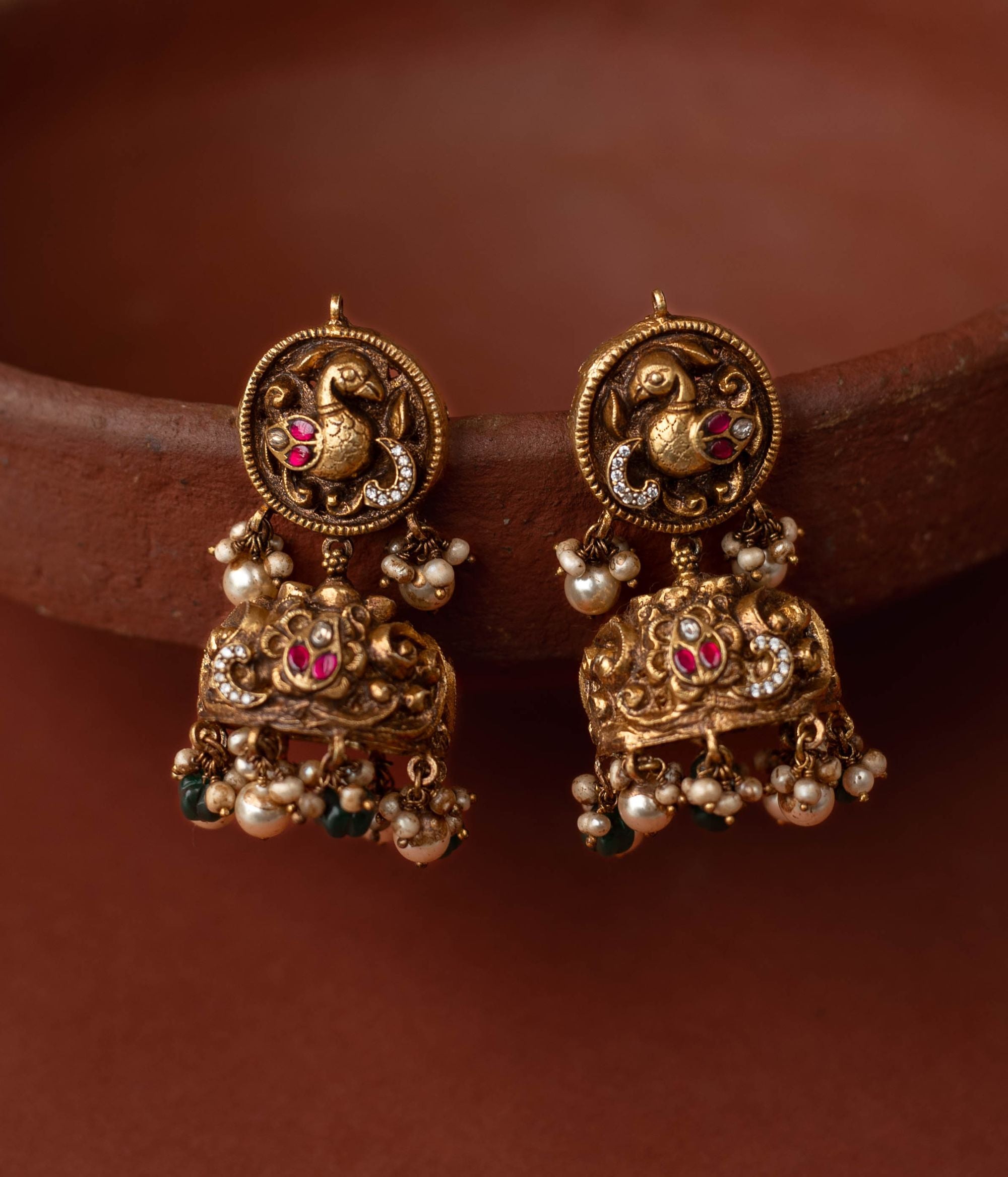Red green white kundan earrings with pearls and green beads