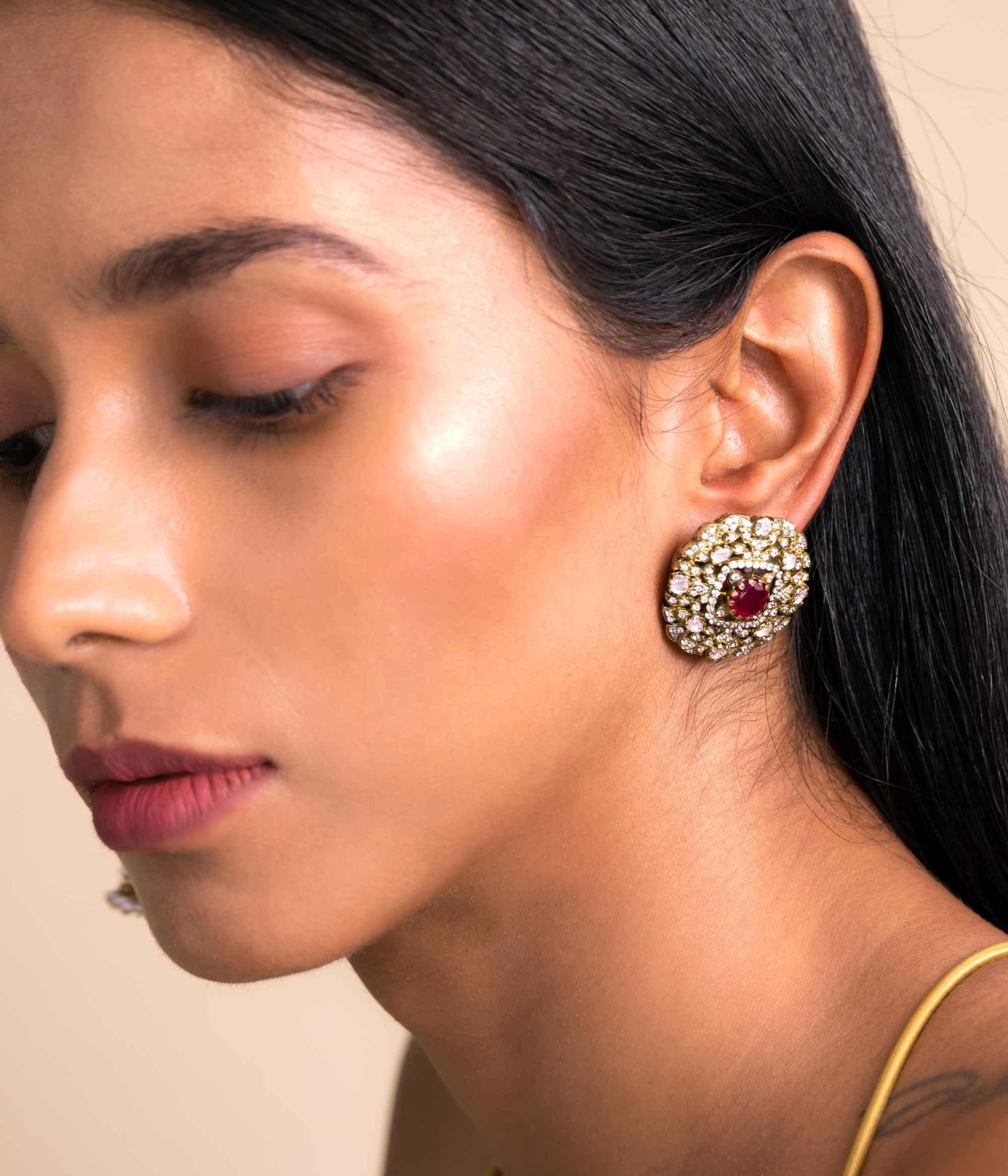 Festive silver stud earrings with polki, CZ, and red stones