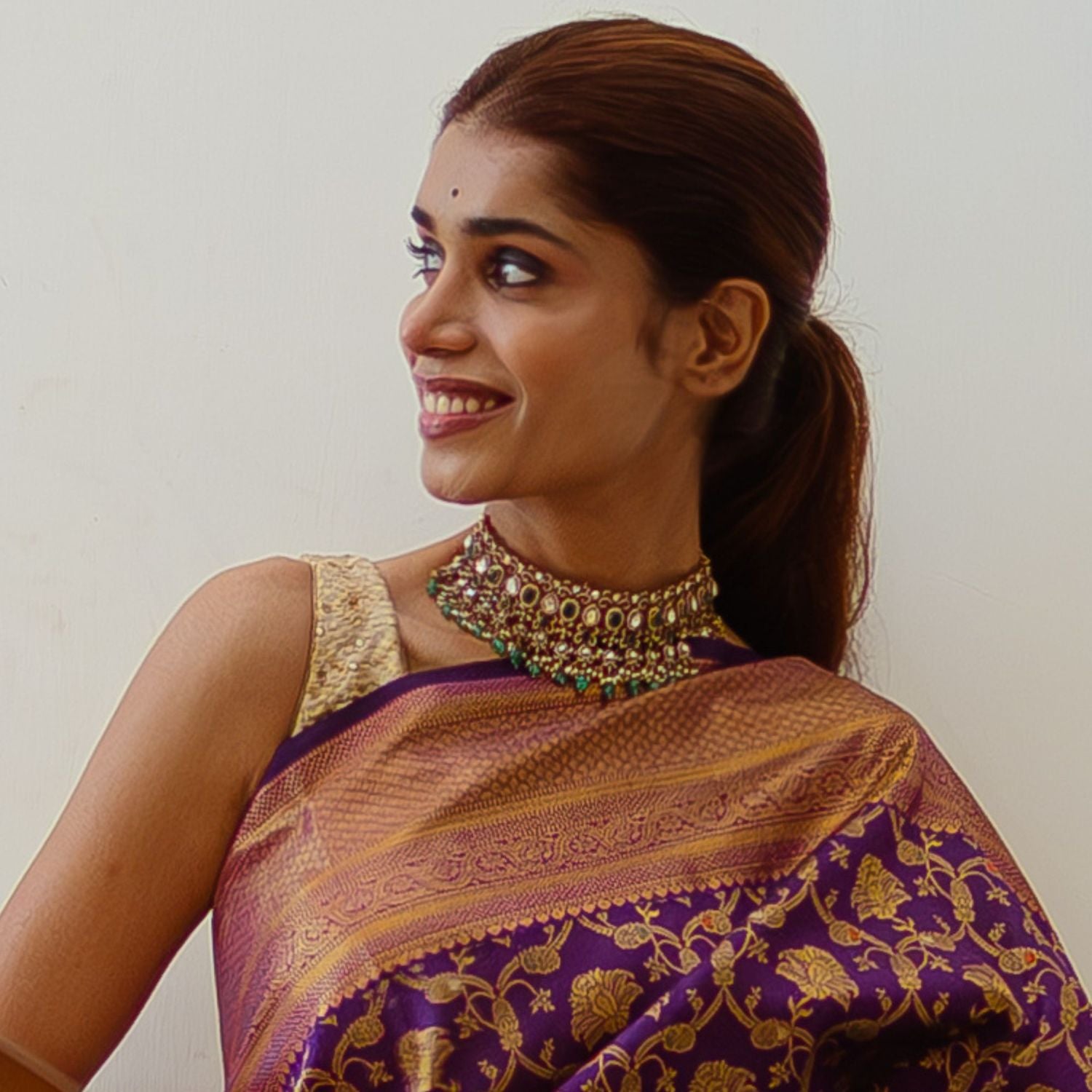 The Yamini Choker beautifully blends tradition and modernity, featuring green gemstones, moissanite polki stones, pearls, green beads, and CZ stones, all set in vintage silver for an elegant, timeless appeal.