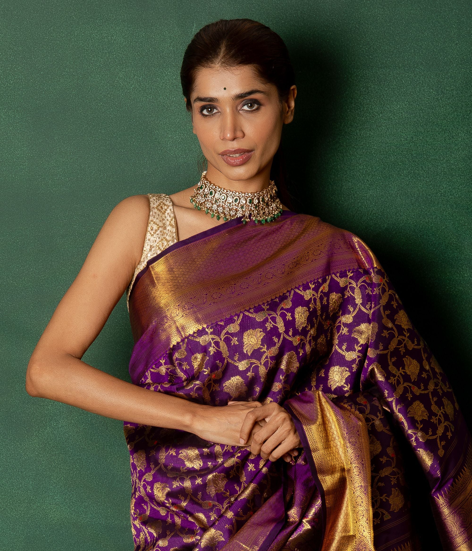 The Yamini Choker beautifully blends tradition and modernity, featuring green gemstones, moissanite polki stones, pearls, green beads, and CZ stones, all set in vintage silver for an elegant, timeless appeal.