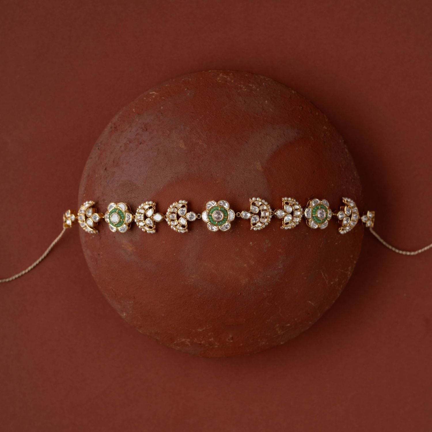 whimsical elegance with Polki and beads florals in gold-plated silver, evoking boundless stories.